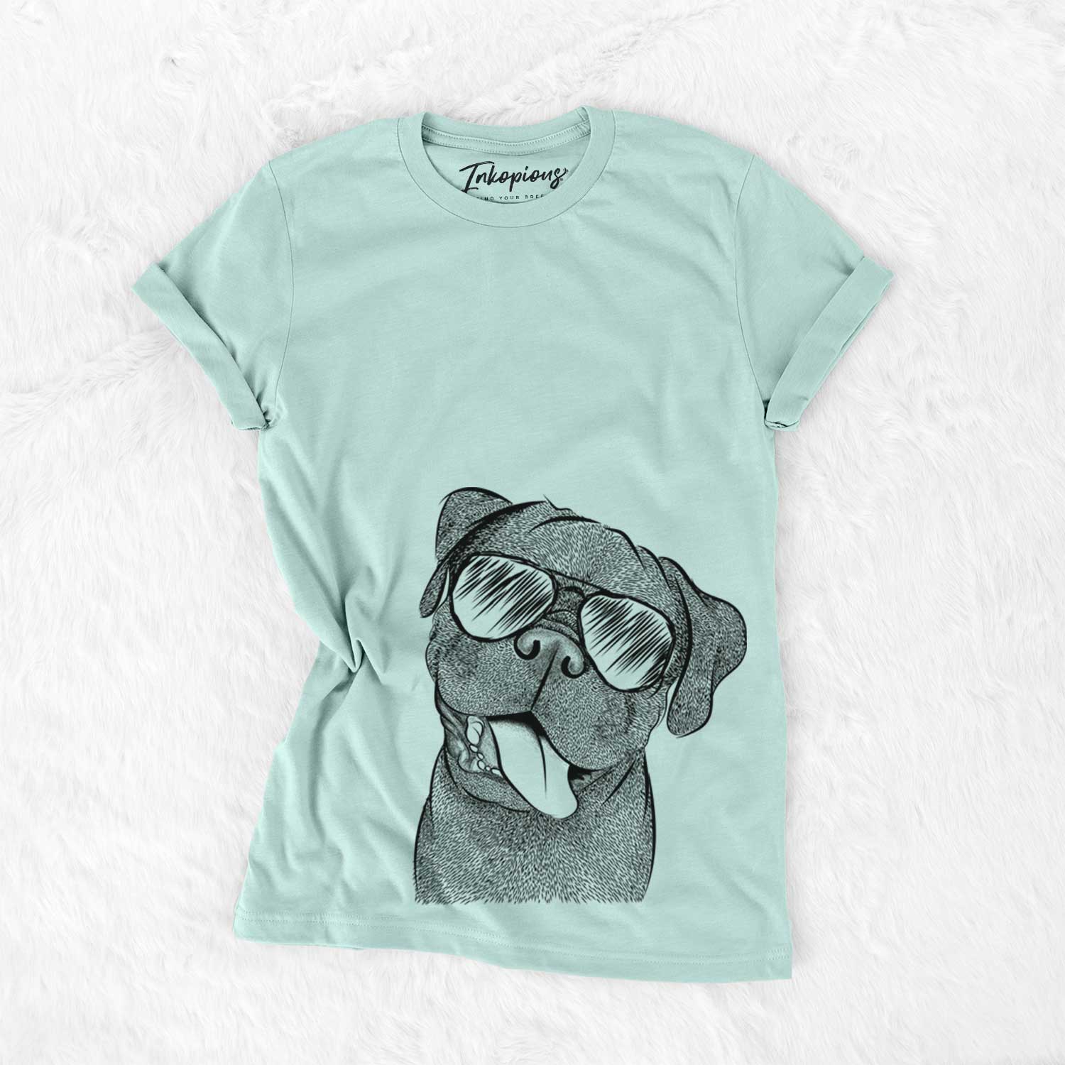Hand-drawn sketch of Dudley Danger the Pug wearing aviator sunglasses on a Heather Sage Unisex crewneck