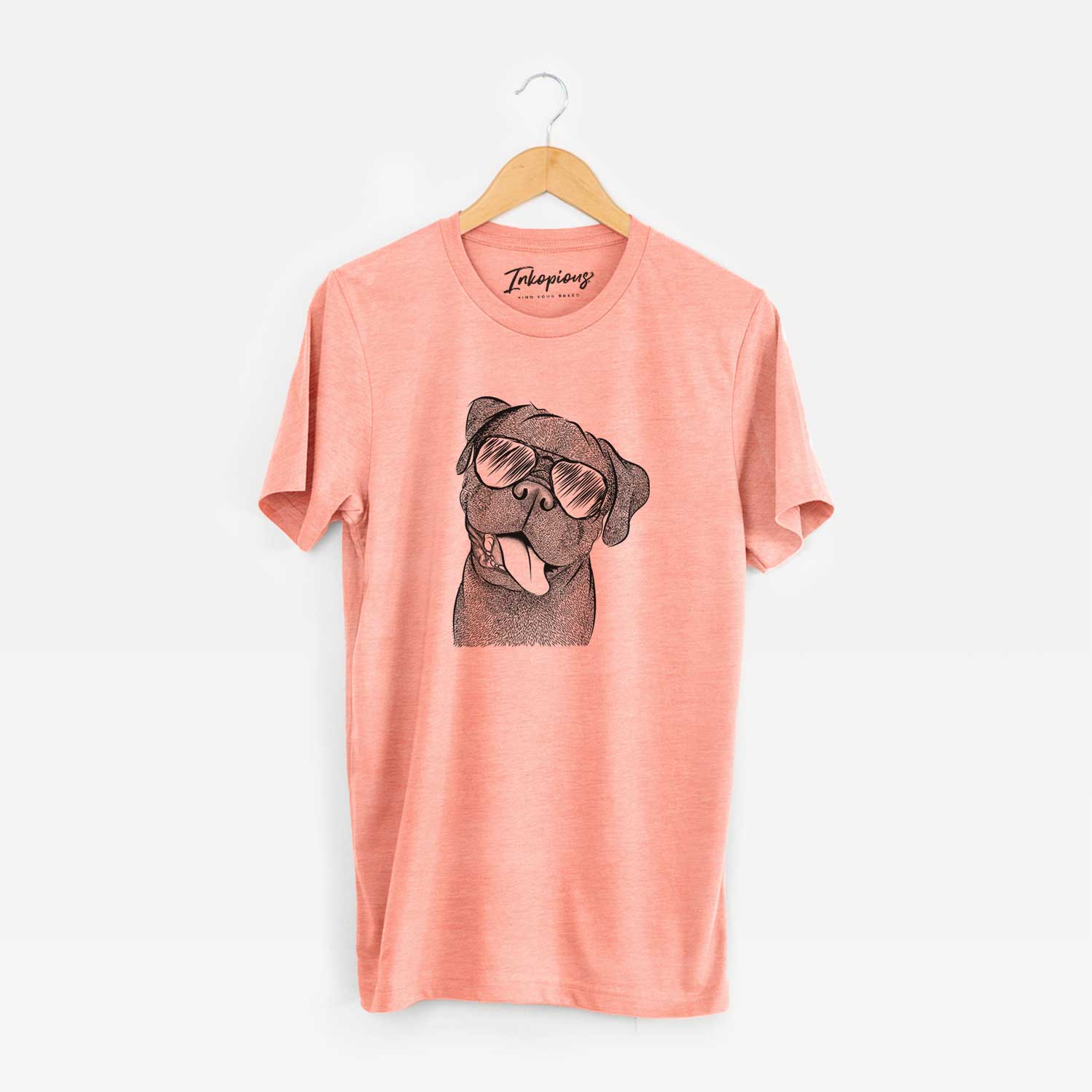 Hand-drawn sketch of Dudley Danger the Pug wearing aviator sunglasses on a Sunset Unisex crewneck