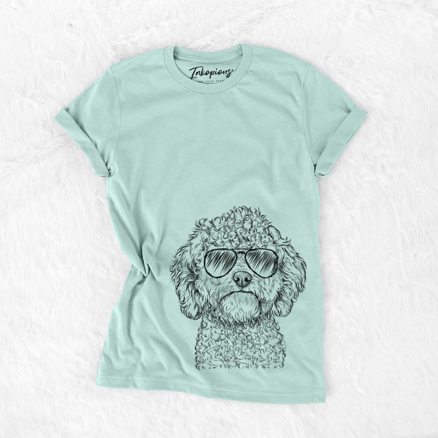 Hand-drawn sketch of Edgar the Shihpoo wearing aviator sunglasses on a Heather Sage Unisex crewneck