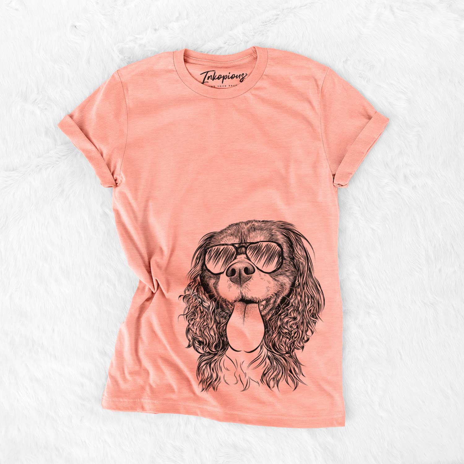 Hand-drawn sketch of Elizabeth the Cavalier King Charles Spaniel wearing aviator sunglasses on a Sunset Bella Canvas Unisex Crewneck