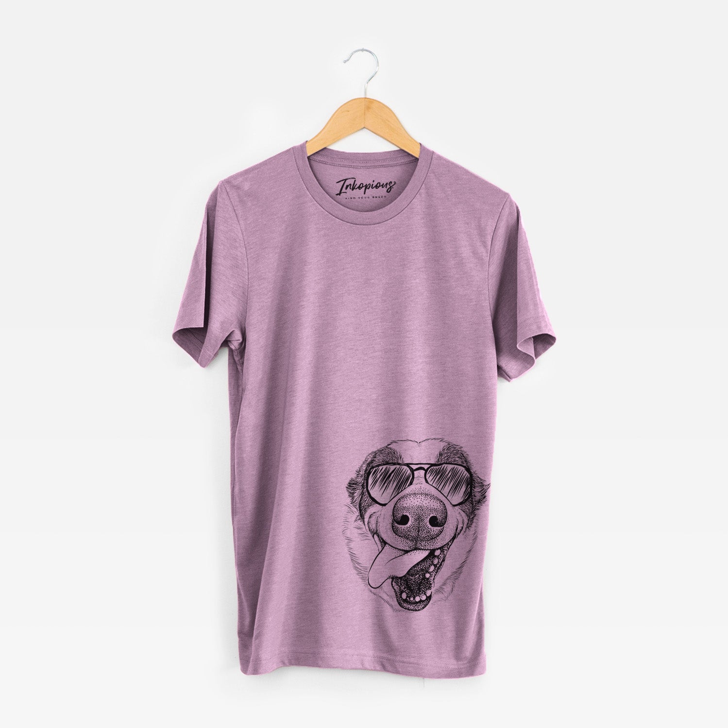 Hand-drawn sketch of Elwood the Border Collie wearing aviator sunglasses on an Orchid Unisex crewneck