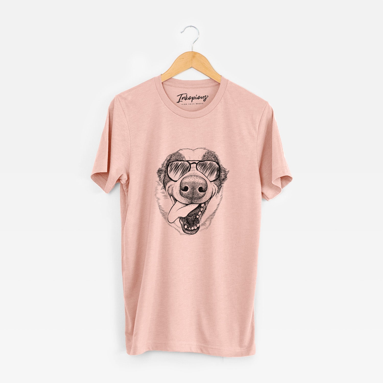 Hand-drawn sketch of Elwood the Border Collie wearing aviator sunglasses on a Peach Unisex crewneck