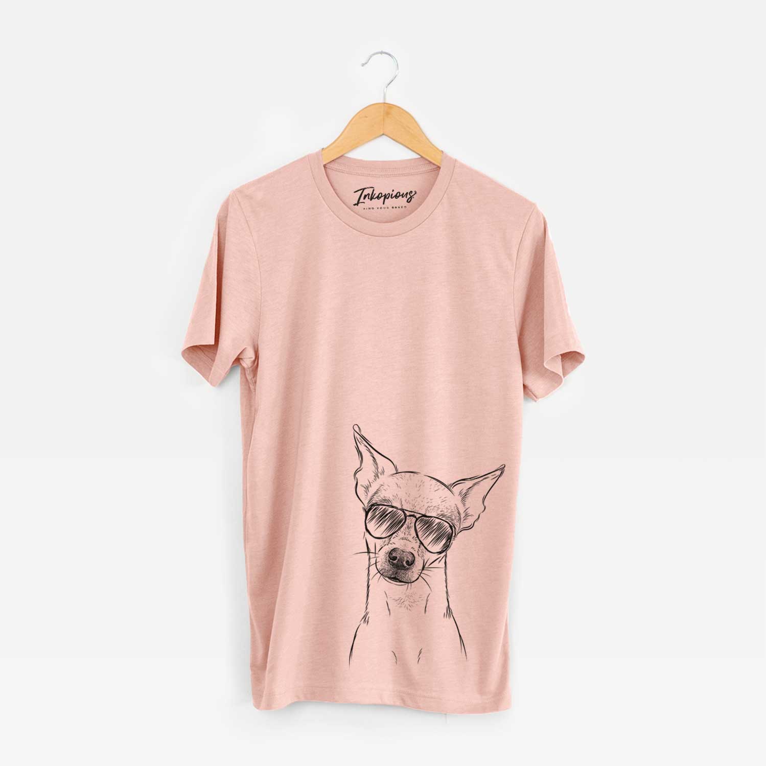 Hand-drawn sketch of Emee the Chihuahua wearing aviator sunglasses on a Peach Bella Canvas Unisex Crewneck