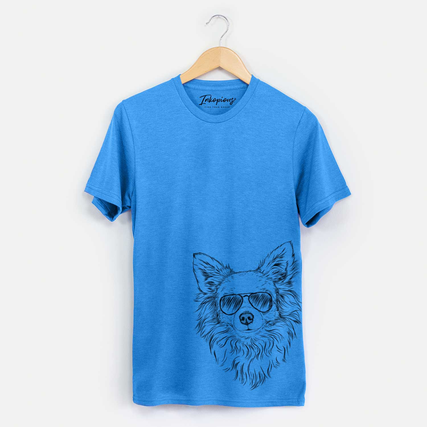 Hand-drawn sketch of Emma the Longhaired Chihuahua wearing aviator sunglasses on a Blue Unisex crewneck