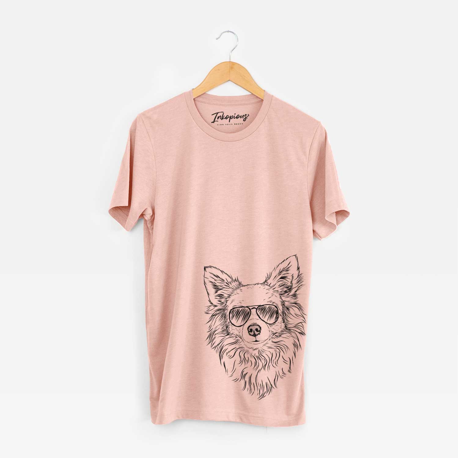 Hand-drawn sketch of Emma the Longhaired Chihuahua wearing aviator sunglasses on a Peach Bella Canvas Unisex Crewneck
