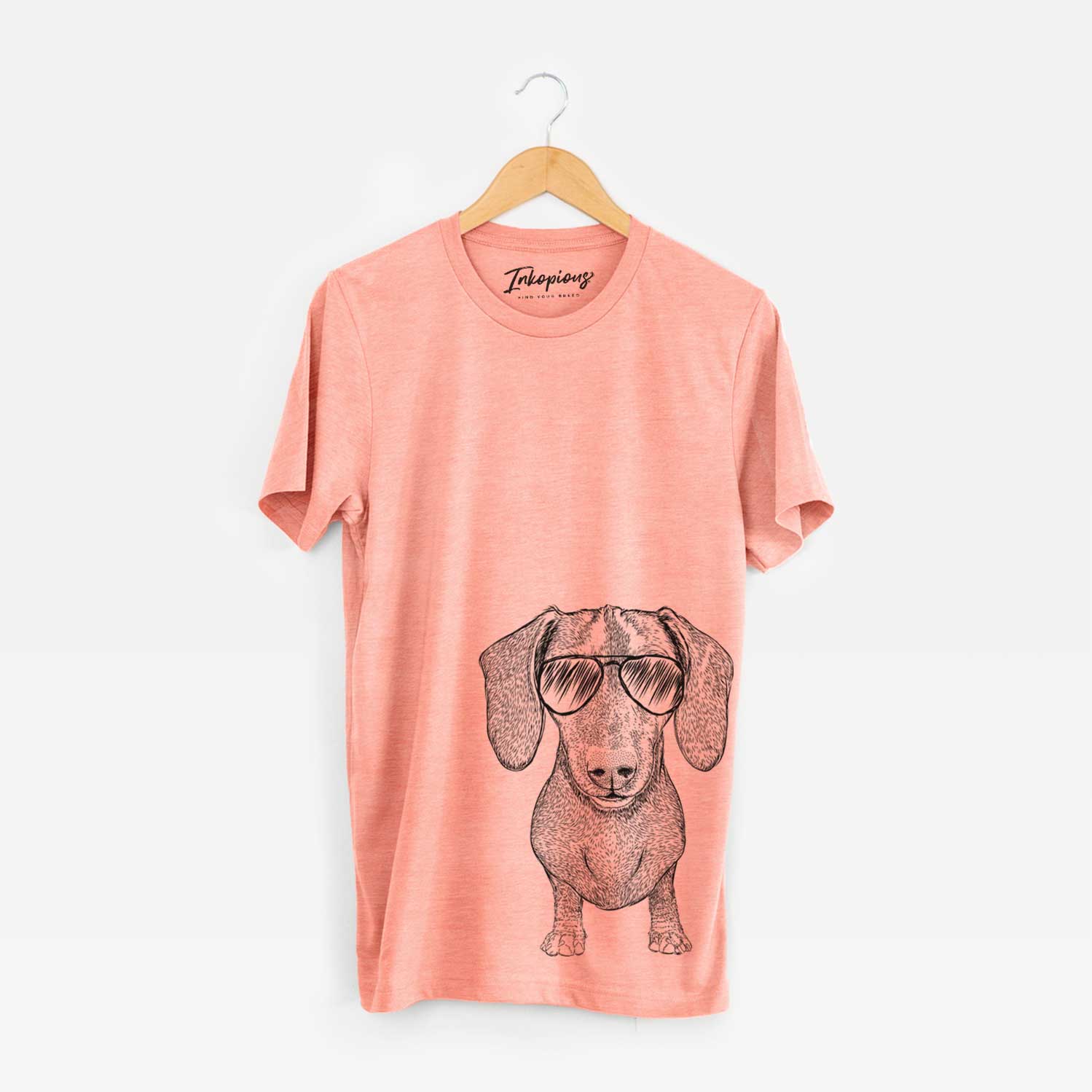 Hand-drawn sketch of Ernie the Mini Dachshund wearing aviator sunglasses on a Sunset Unisex crewneck