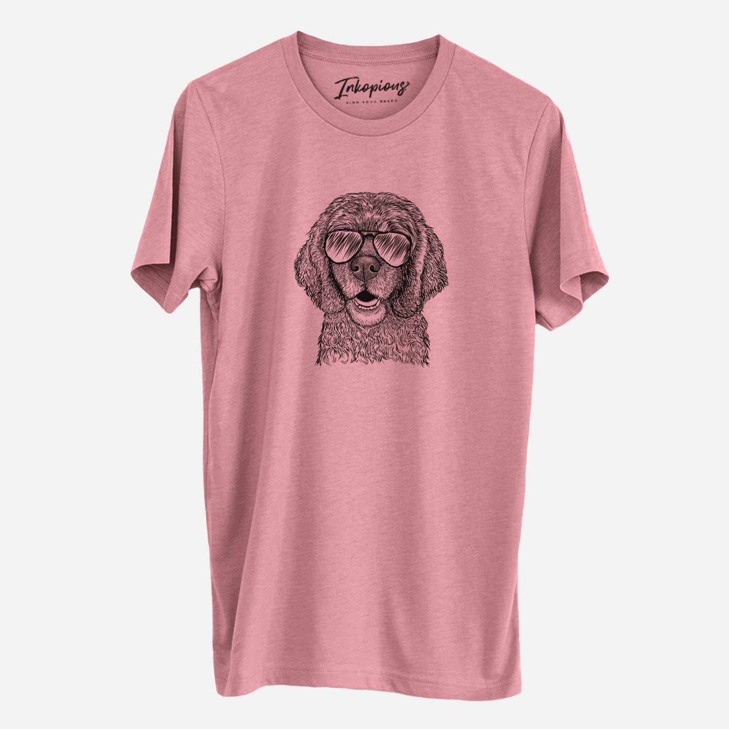 Hand-drawn sketch of Fannie Mae the Cocker Spaniel wearing aviator sunglasses on a Mauve Unisex crewneck