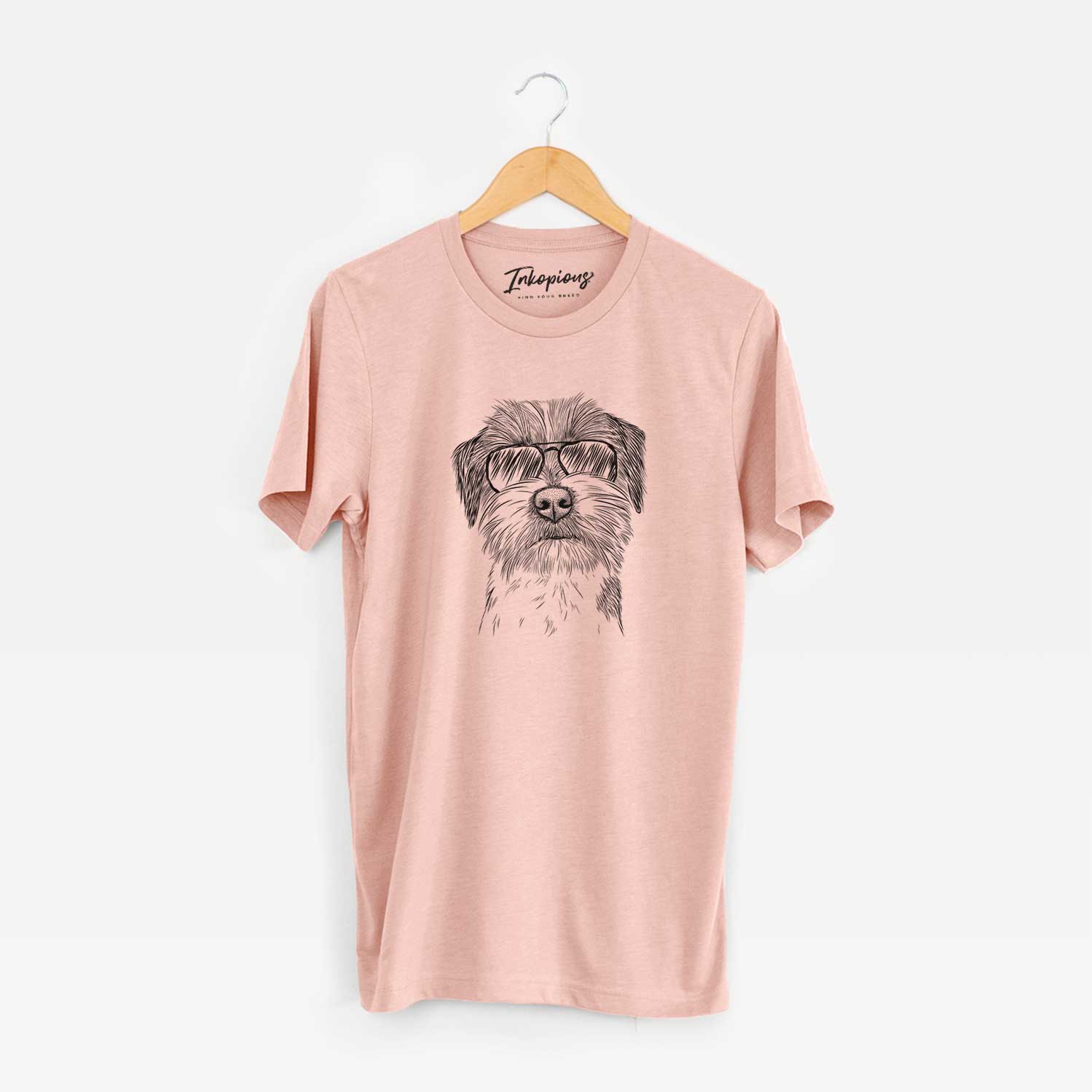 Hand-drawn sketch of Feis the Parson Russell Terrier wearing aviator sunglasses on a Peach Unisex crewneck