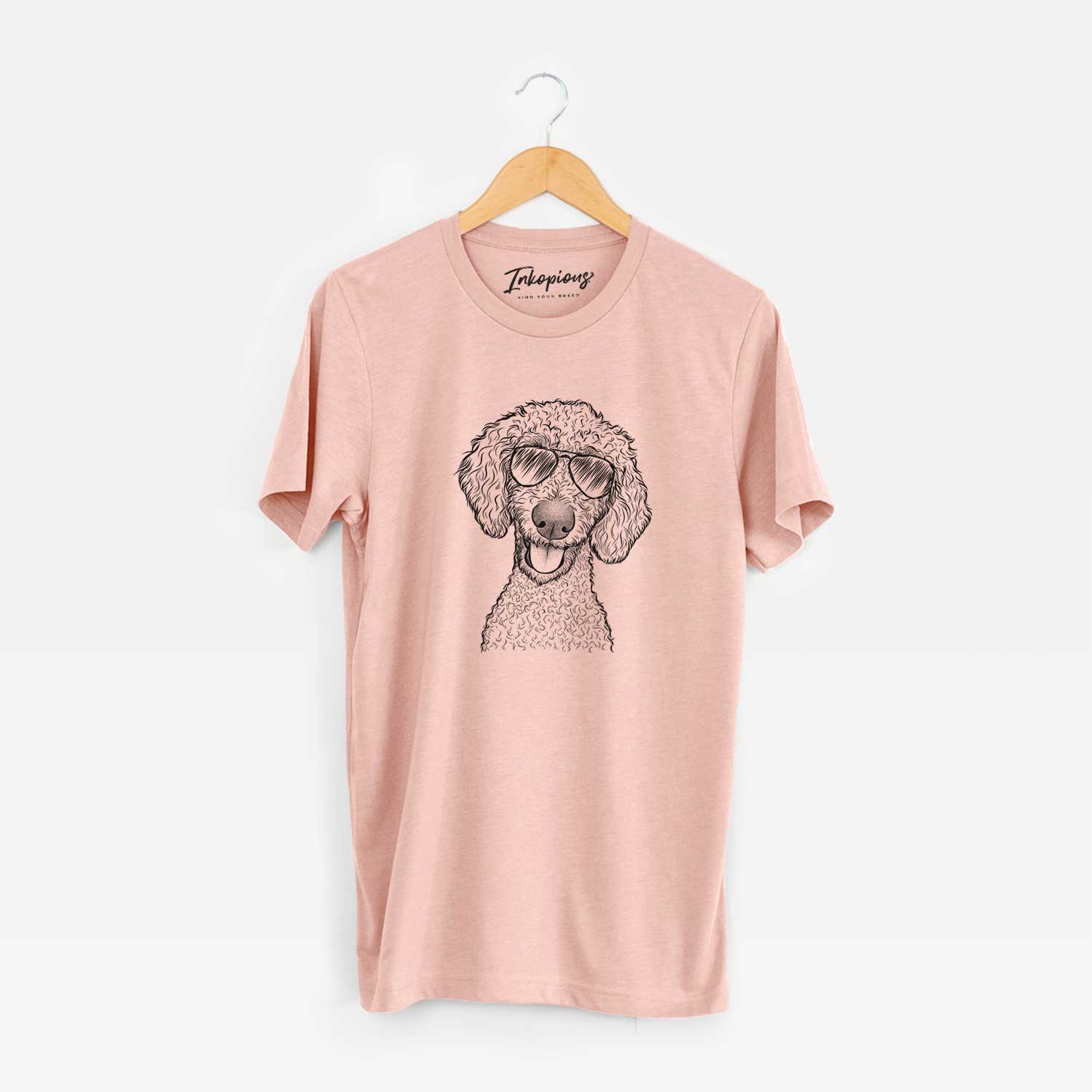 Hand-drawn sketch of Fenway the Goldendoodle wearing aviator sunglasses on a Peach Unisex crewneck
