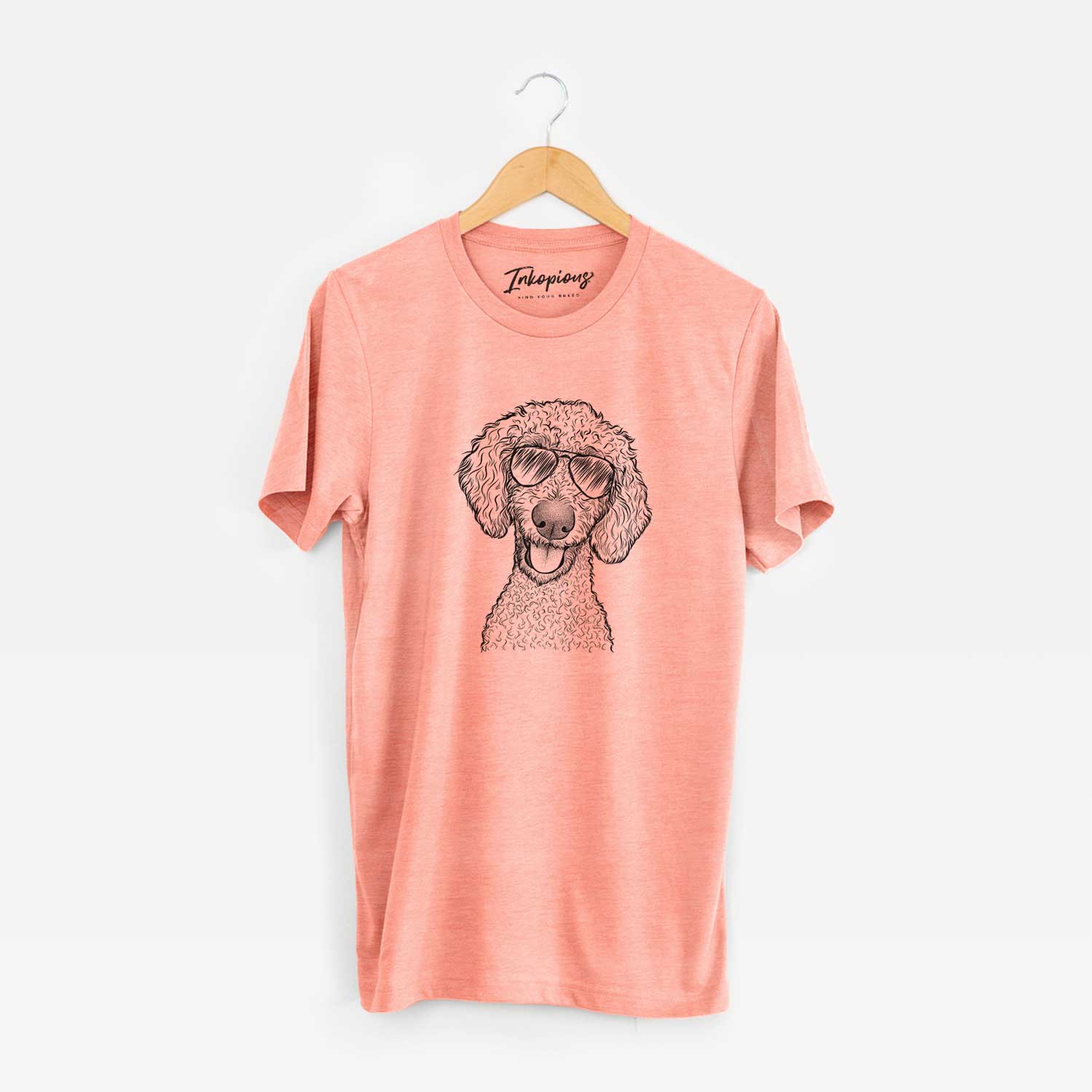 Hand-drawn sketch of Fenway the Goldendoodle wearing aviator sunglasses on a Sunset Unisex crewneck