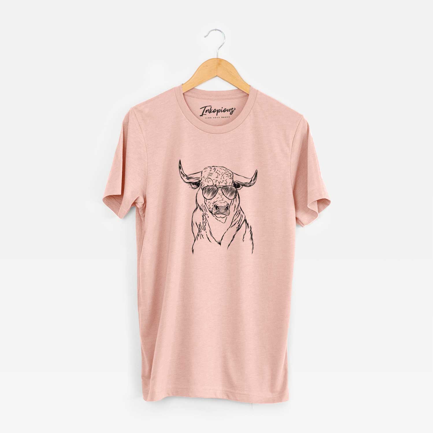 Hand-drawn sketch of Ferdinand the Bull wearing aviator sunglasses on a Peach Unisex crewneck