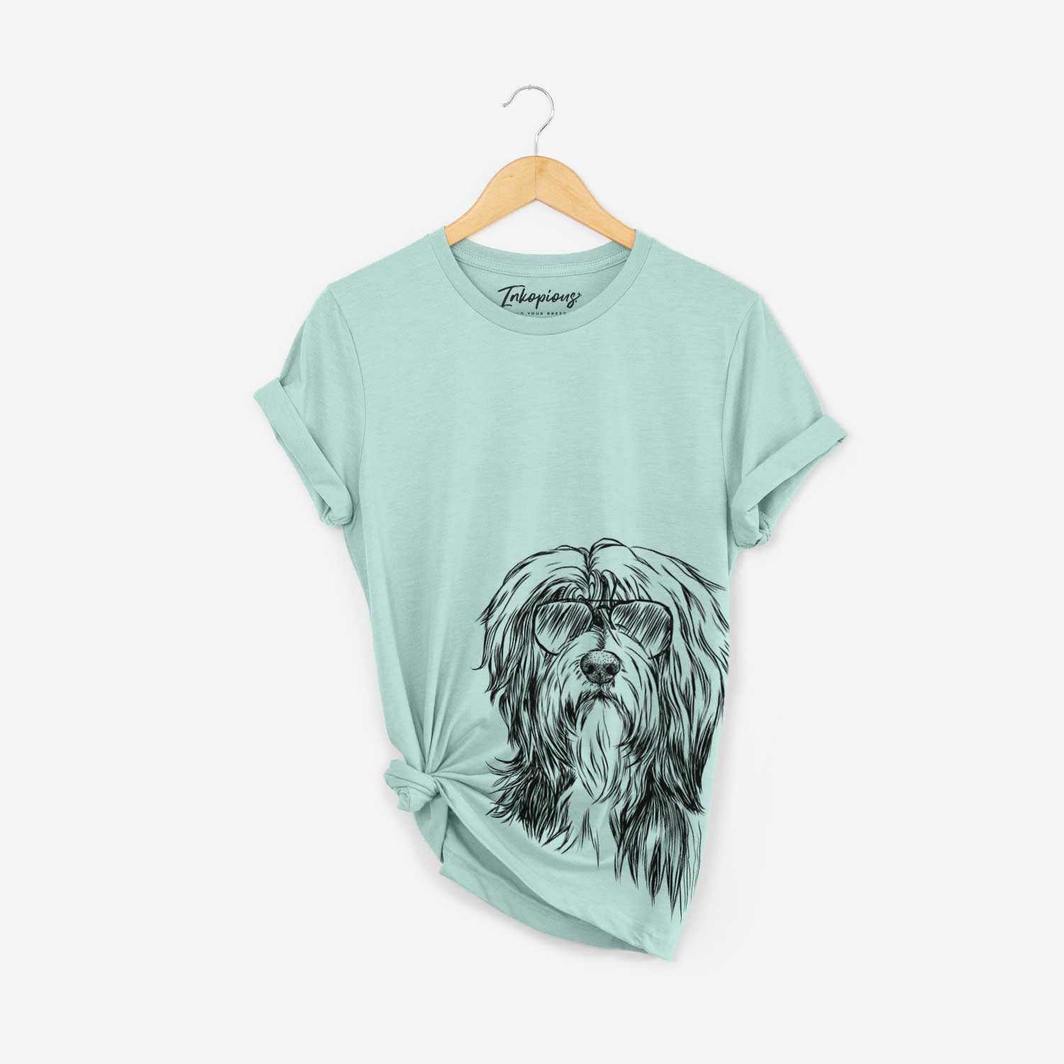 Hand-drawn sketch of Fiji the Polish Lowland Sheepdog wearing aviator sunglasses on a Heather Sage Bella Canvas Unisex Crewneck