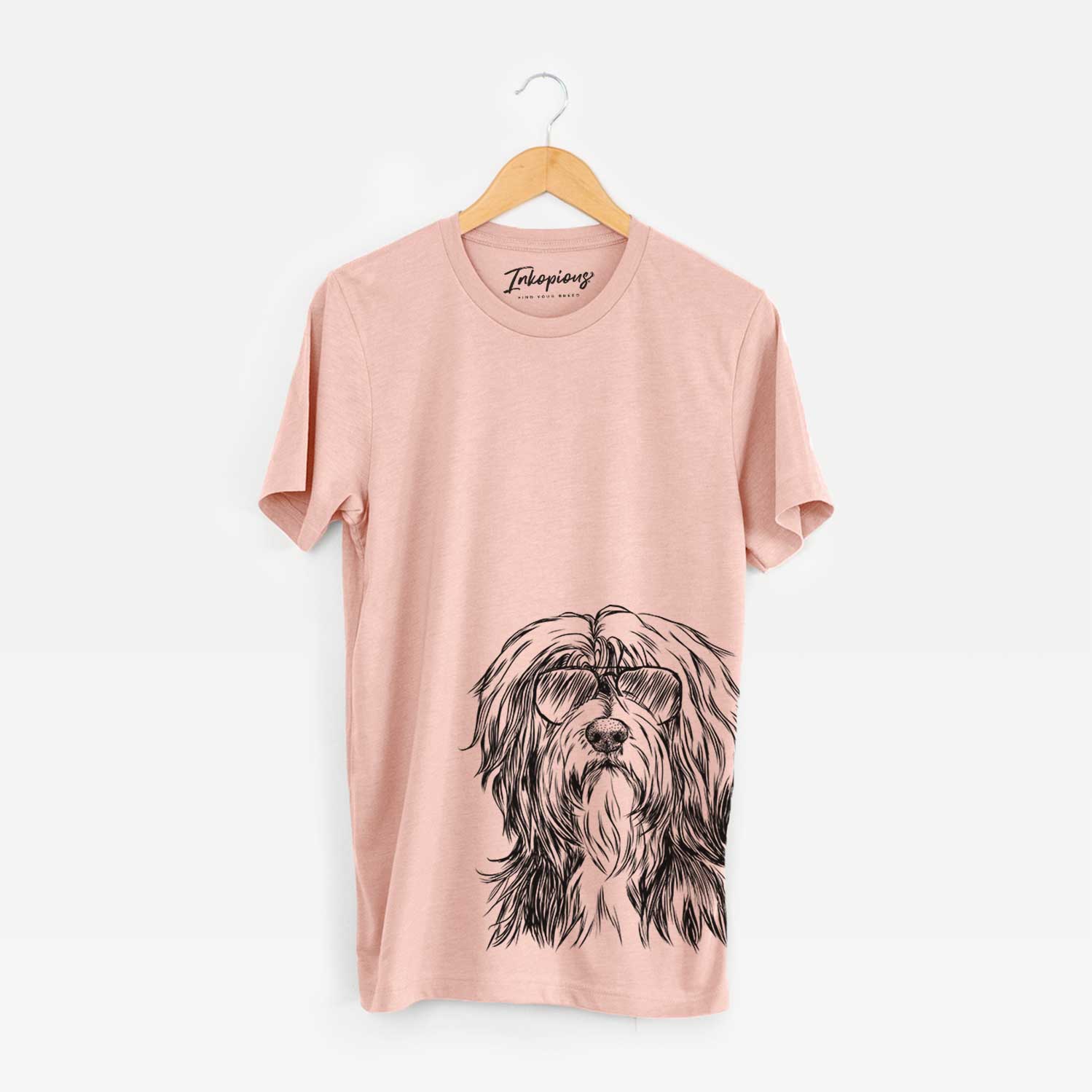 Hand-drawn sketch of Fiji the Polish Lowland Sheepdog wearing aviator sunglasses on a Peach Bella Canvas Unisex Crewneck