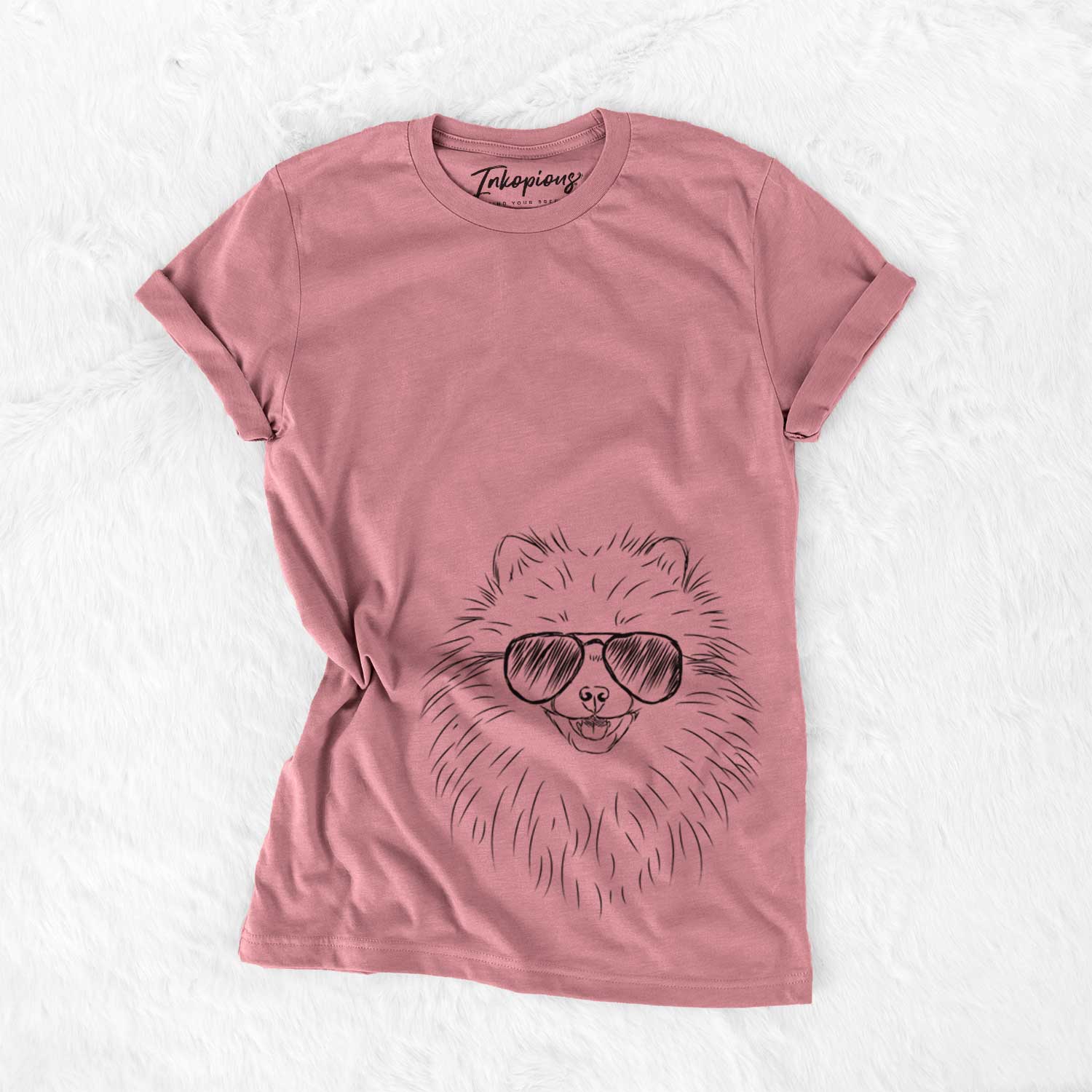 Hand-drawn sketch of Finn the Pomeranian wearing aviator sunglasses on a Mauve Bella Canvas Unisex Crewneck