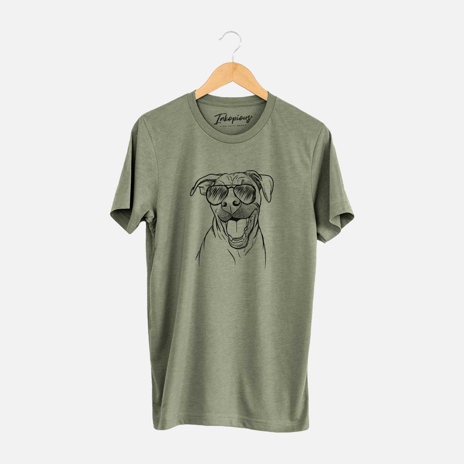 Hand-drawn sketch of Finn the Hound Mix wearing aviator sunglasses on an Olive Unisex crewneck