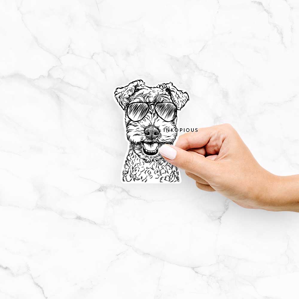 Hand-drawn sketch of Fintan the Irish Troodle wearing aviator sunglasses on a decal sticker