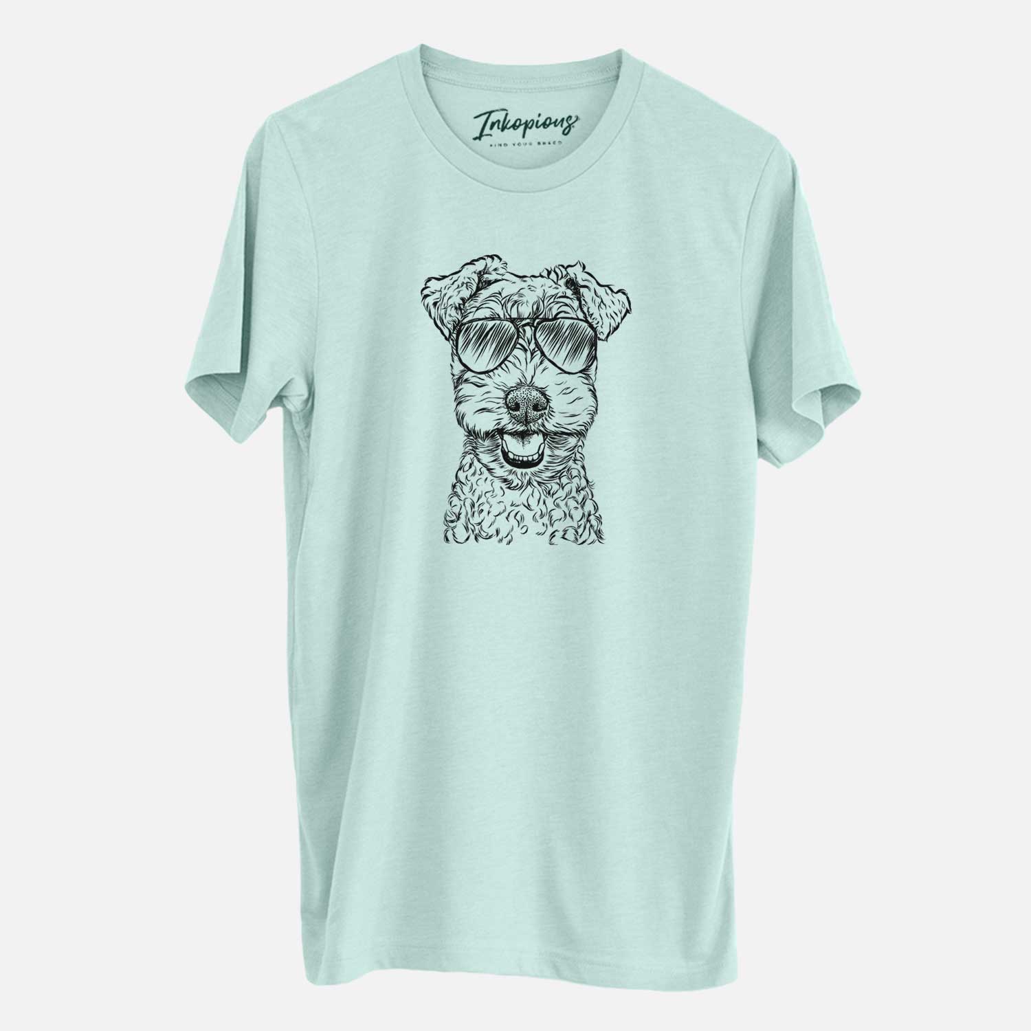 Hand-drawn sketch of Fintan the Irish Troodle wearing aviator sunglasses on a Heather Sage Unisex crewneck