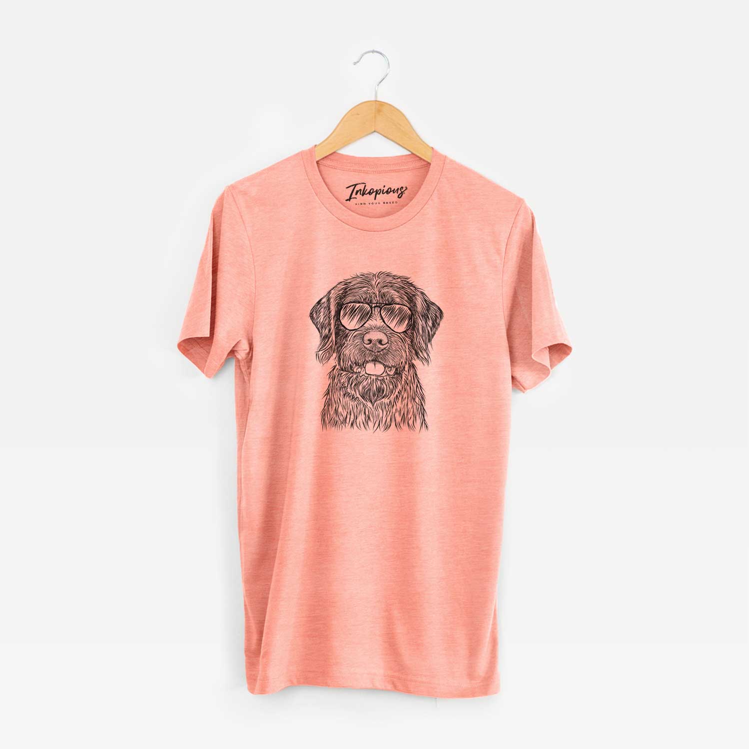 Hand-drawn sketch of Fletcher the Wirehaired Pointing Griffon wearing aviator sunglasses on a Sunset Unisex crewneck
