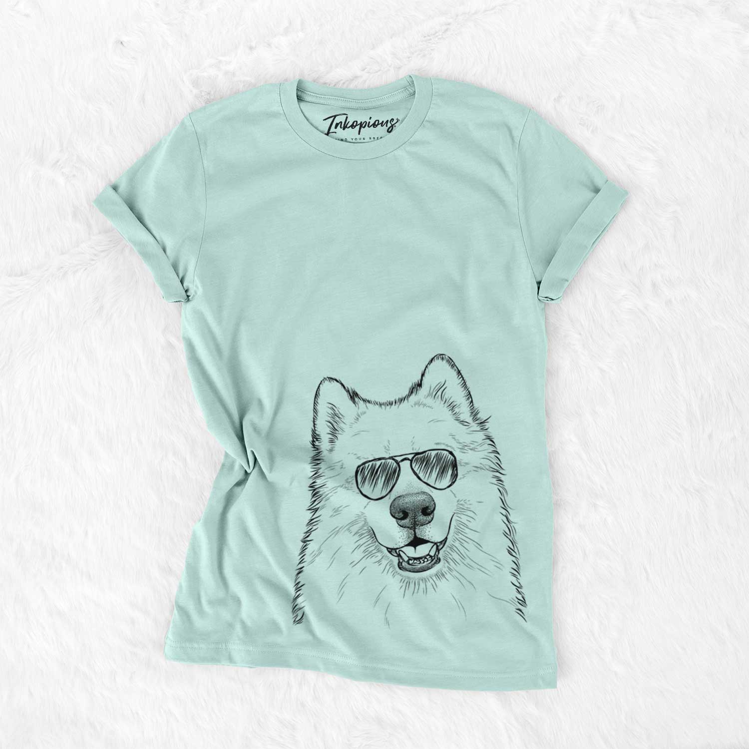 Hand-drawn sketch of Foster the Samoyed wearing aviator sunglasses on a Heather Sage Unisex crewneck
