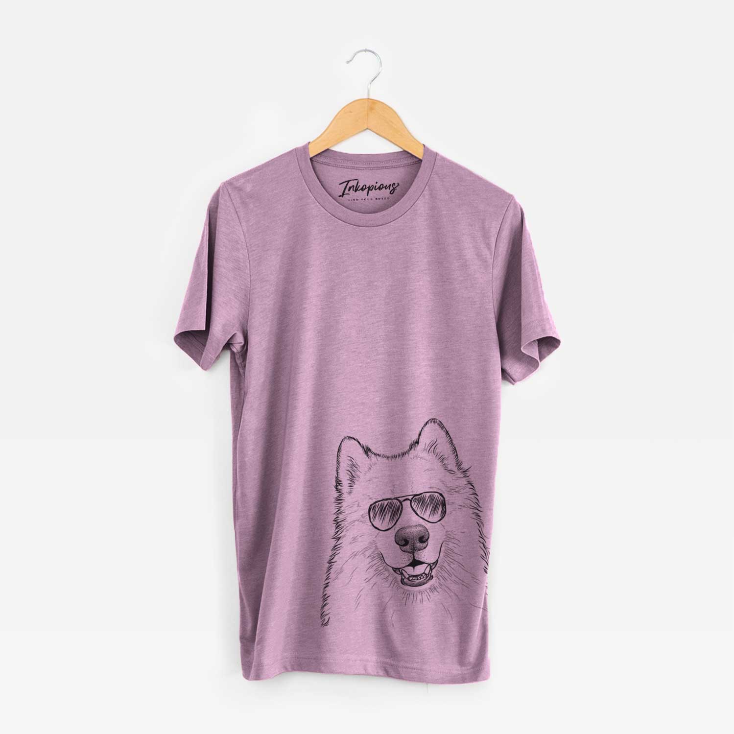 Hand-drawn sketch of Foster the Samoyed wearing aviator sunglasses on an Orchid Bella Canvas Unisex Crewneck