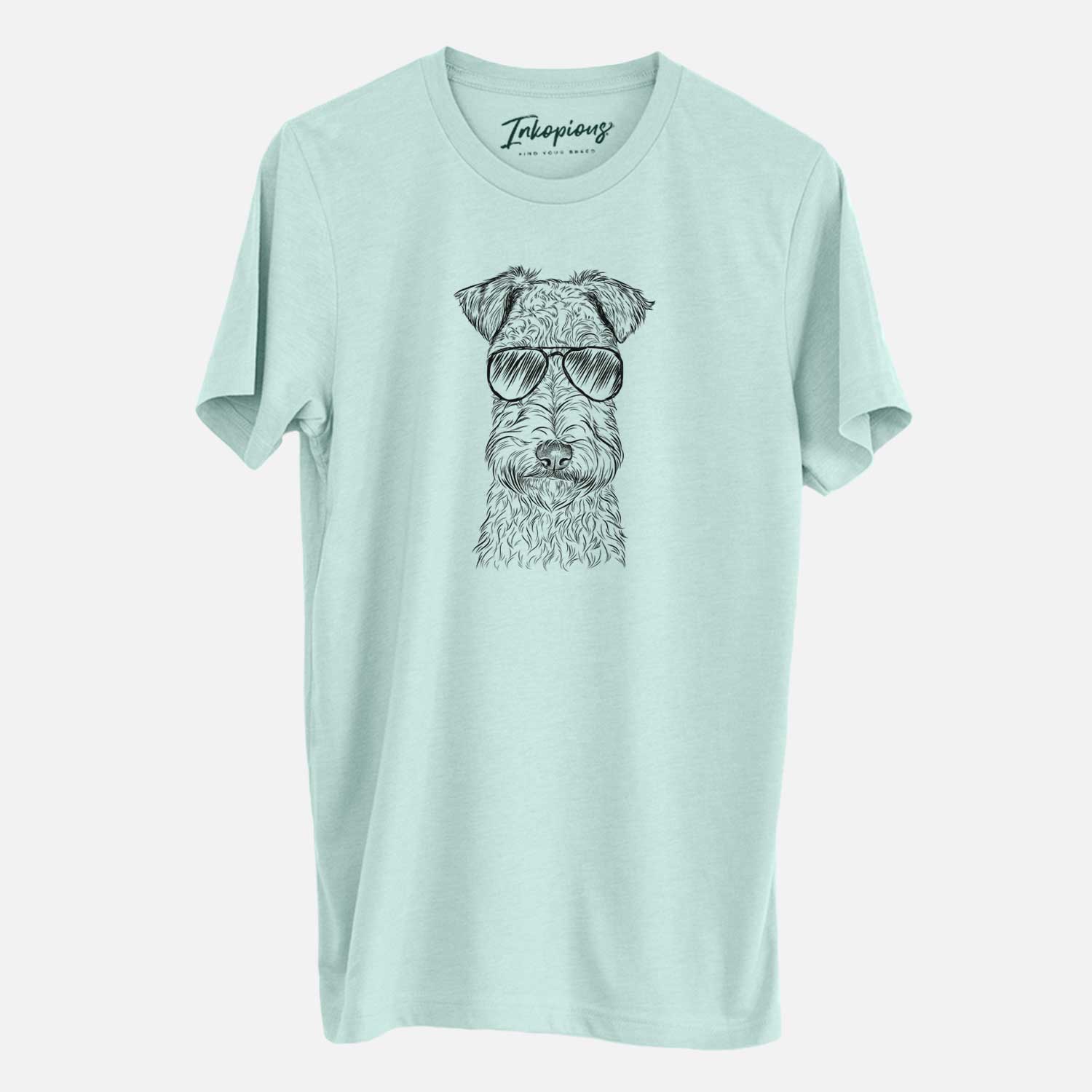Hand-drawn sketch of Frida the Lakeland Terrier wearing aviator sunglasses on a Heather Sage Unisex crewneck