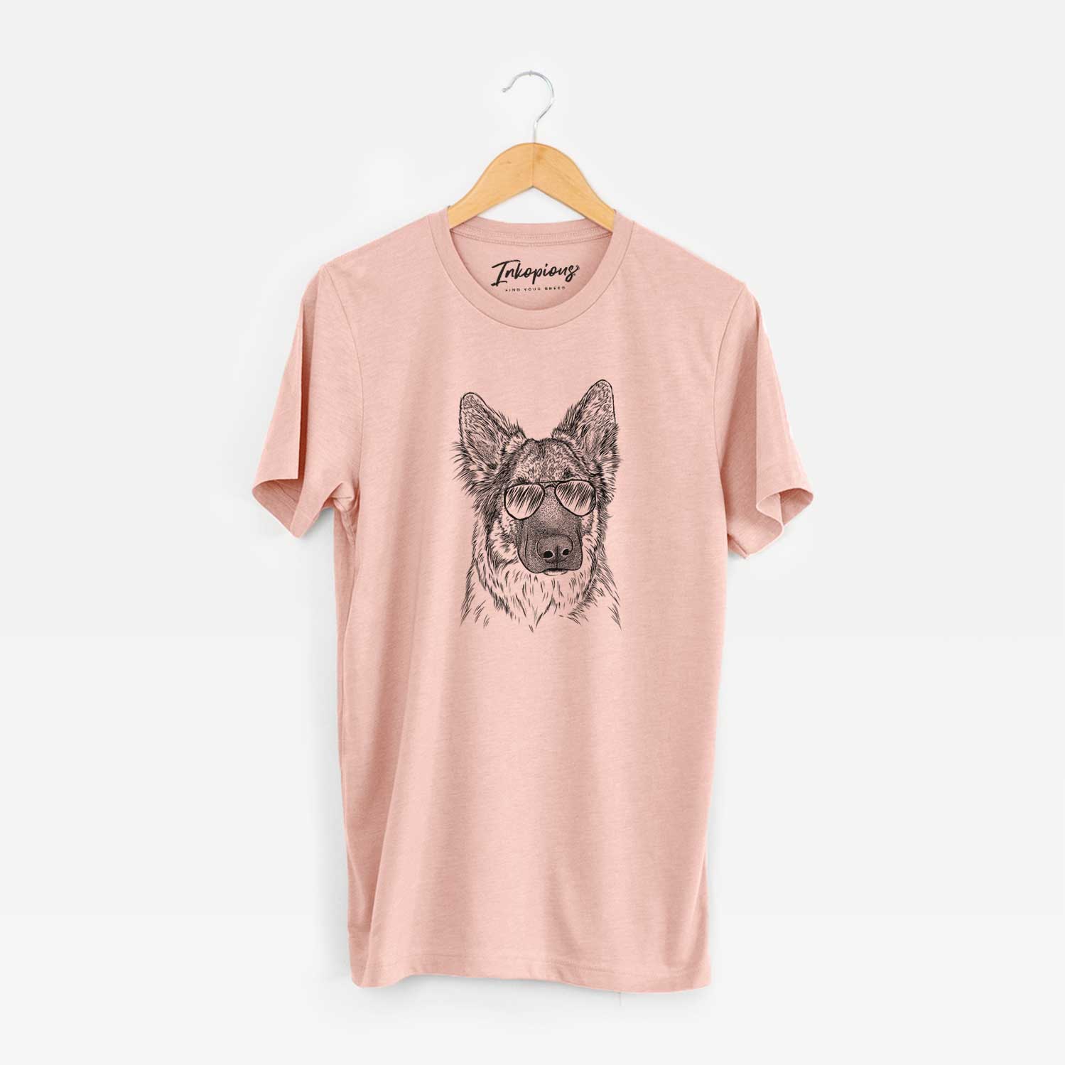 Hand-drawn sketch of Geddy the Shiloh Shepherd wearing aviator sunglasses on a Peach Unisex crewneck