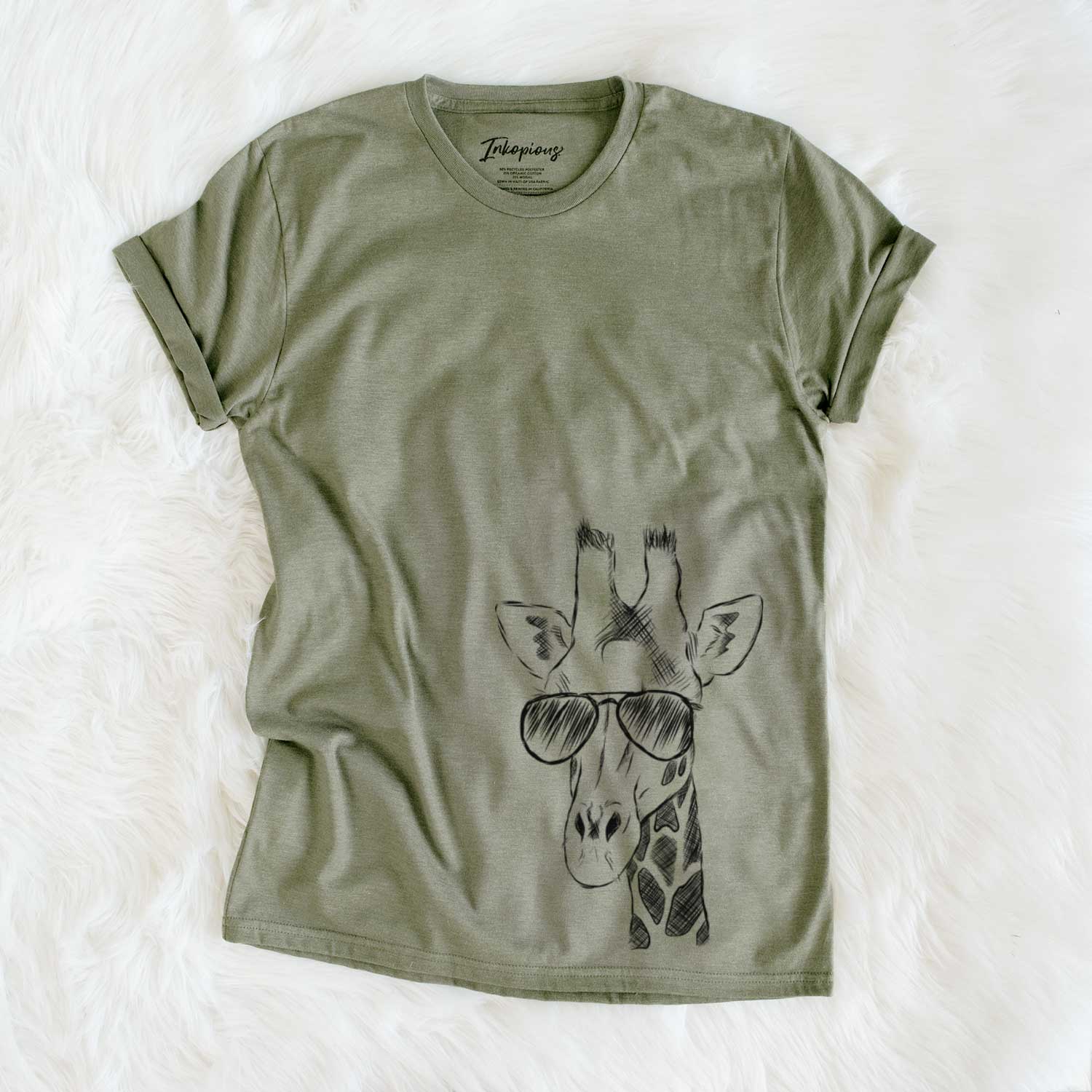 Hand-drawn sketch of Geoffrey the Giraffe wearing aviator sunglasses on an Olive Unisex crewneck