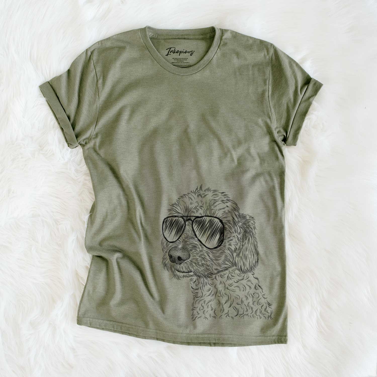 Hand-drawn sketch of Georgie Boy the Mixed Breed wearing aviator sunglasses on an Olive Unisex crewneck