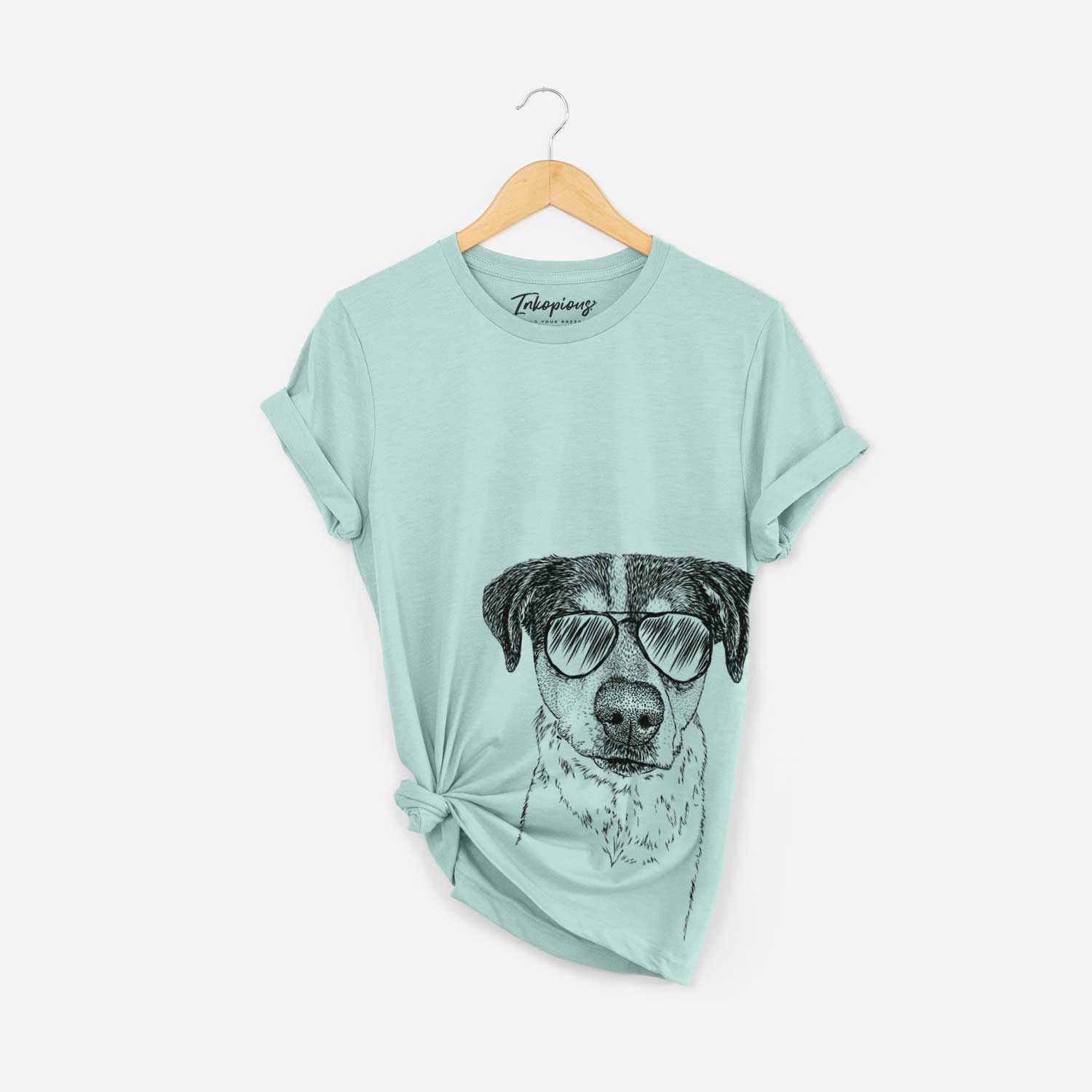 Hand-drawn sketch of Gertrude the Mixed Breed wearing aviator sunglasses on a Heather Sage Bella Canvas Unisex Crewneck