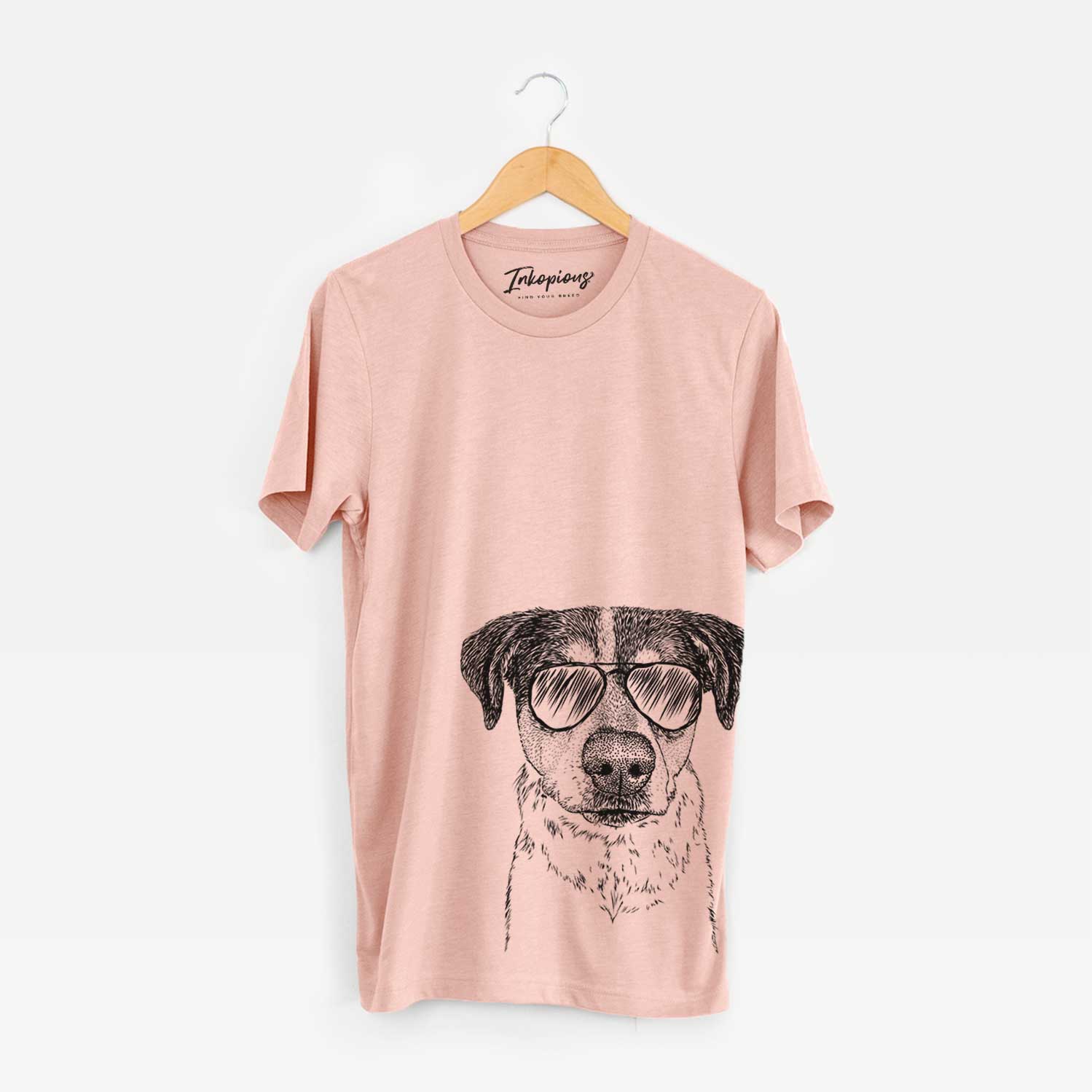 Hand-drawn sketch of Gertrude the Mixed Breed wearing aviator sunglasses on a Peach Bella Canvas Unisex Crewneck