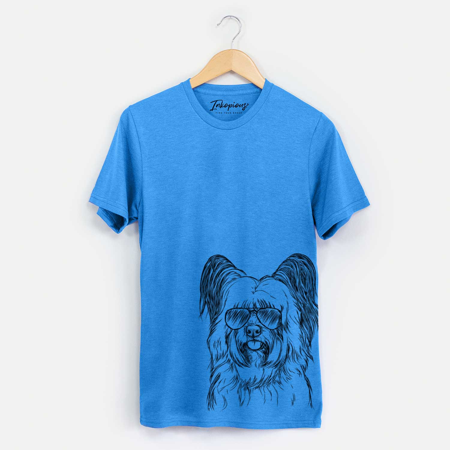 Hand-drawn sketch of Gideon the Skye Terrier wearing aviator sunglasses on a Blue Unisex crewneck
