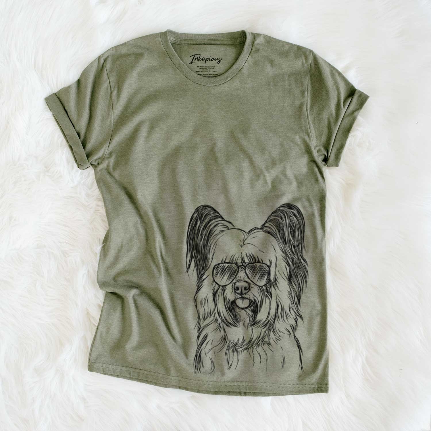 Hand-drawn sketch of Gideon the Skye Terrier wearing aviator sunglasses on an Olive Unisex crewneck