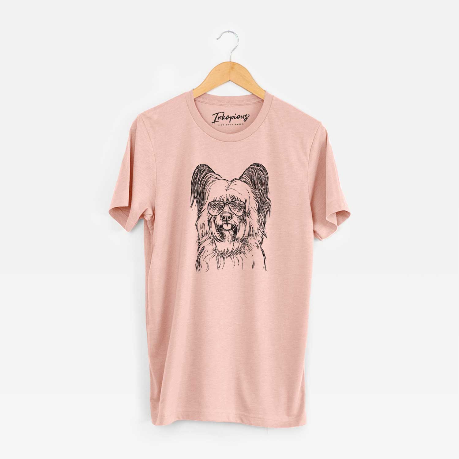 Hand-drawn sketch of Gideon the Skye Terrier wearing aviator sunglasses on a Peach Unisex crewneck