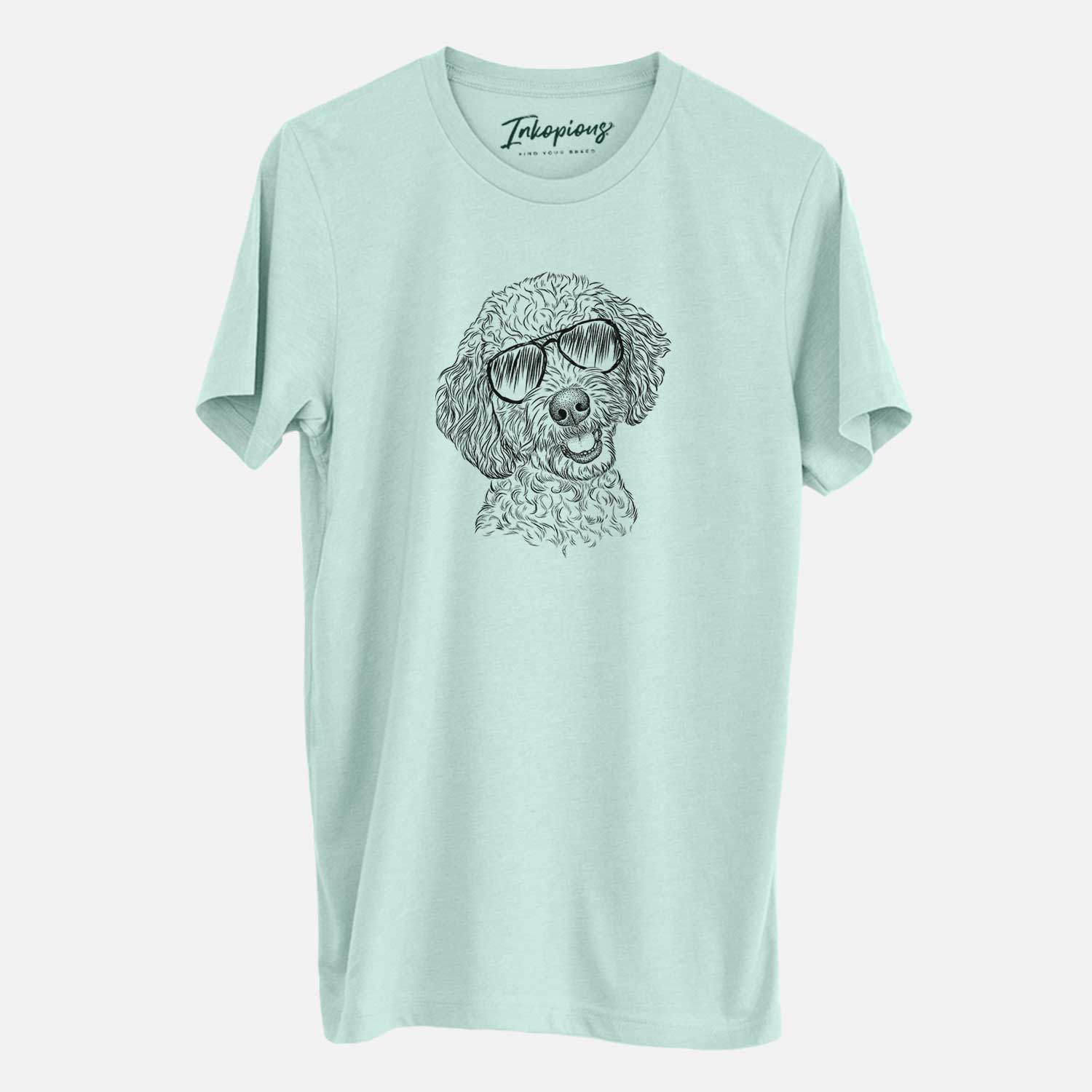 Hand-drawn sketch of Gizmo the Goldendoodle wearing aviator sunglasses on a Heather Sage Unisex crewneck