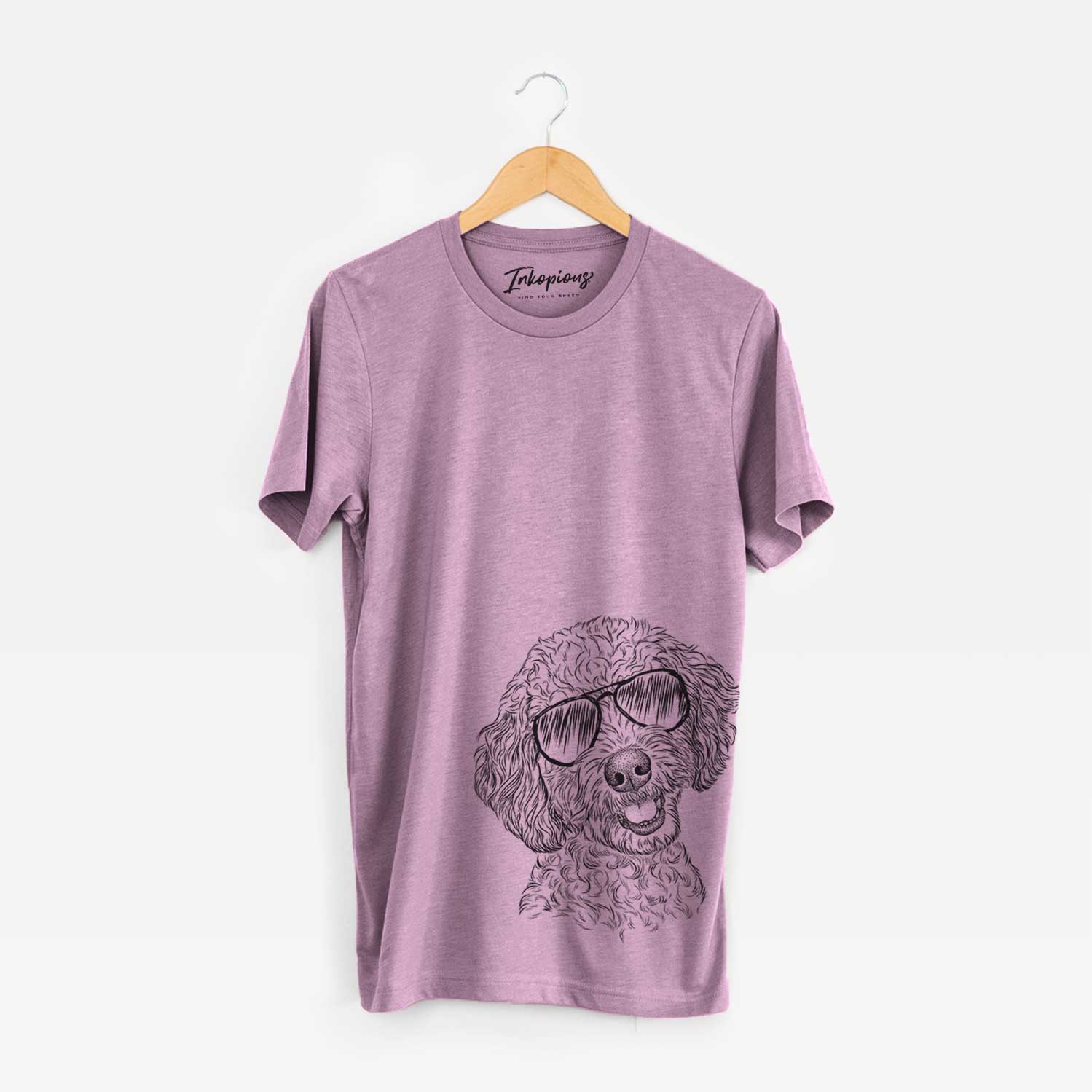 Hand-drawn sketch of Gizmo the Goldendoodle wearing aviator sunglasses on an Orchid Unisex crewneck