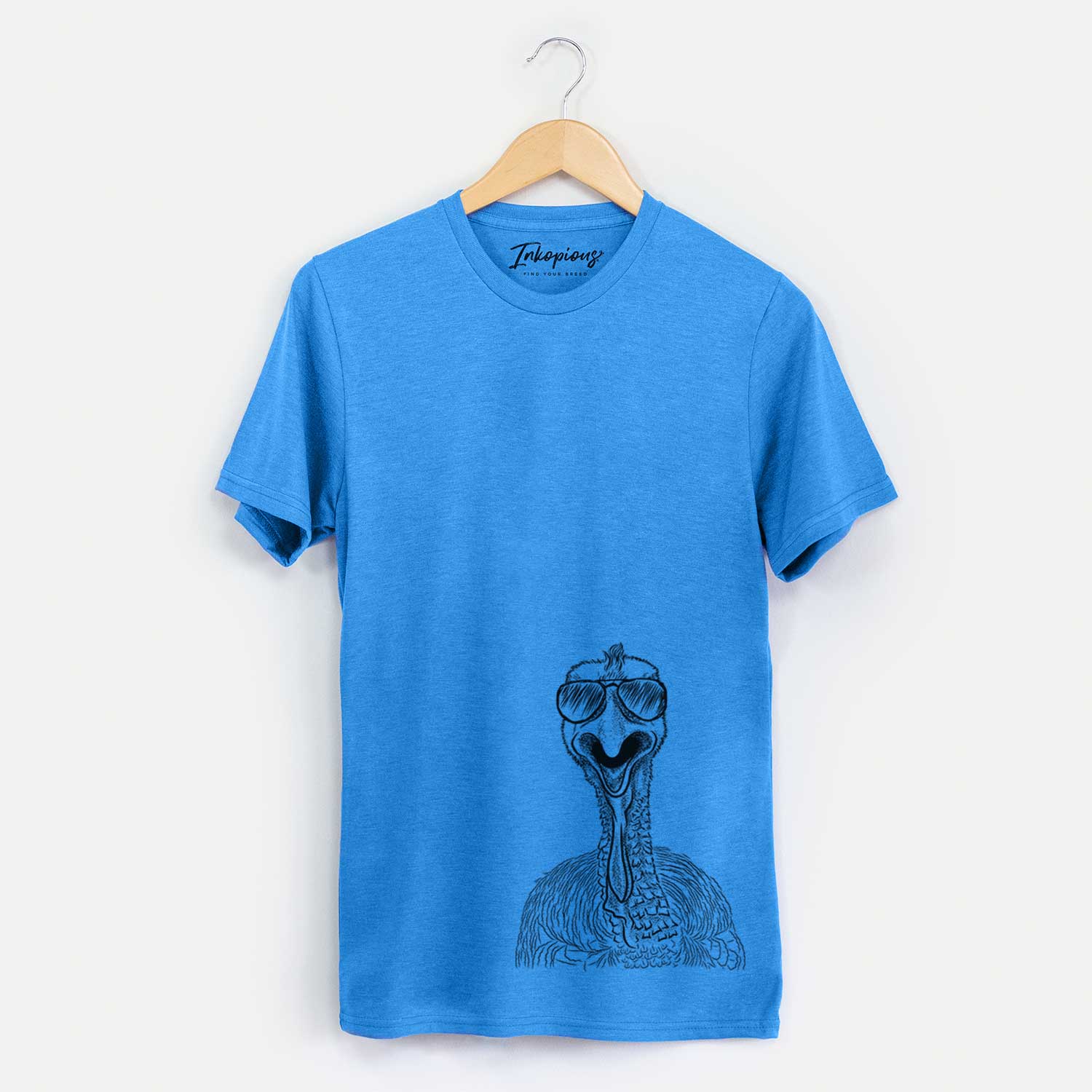Hand-drawn sketch of Gobble the Turkey wearing aviator sunglasses on a Blue Unisex crewneck