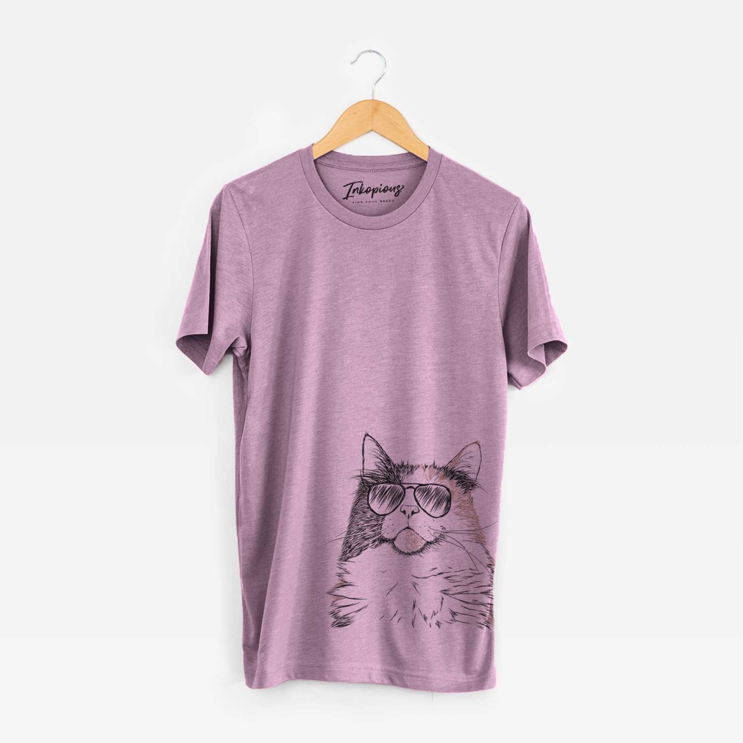 Hand-drawn sketch of Greta the Calico Cat wearing aviator sunglasses on an Orchid Unisex crewneck