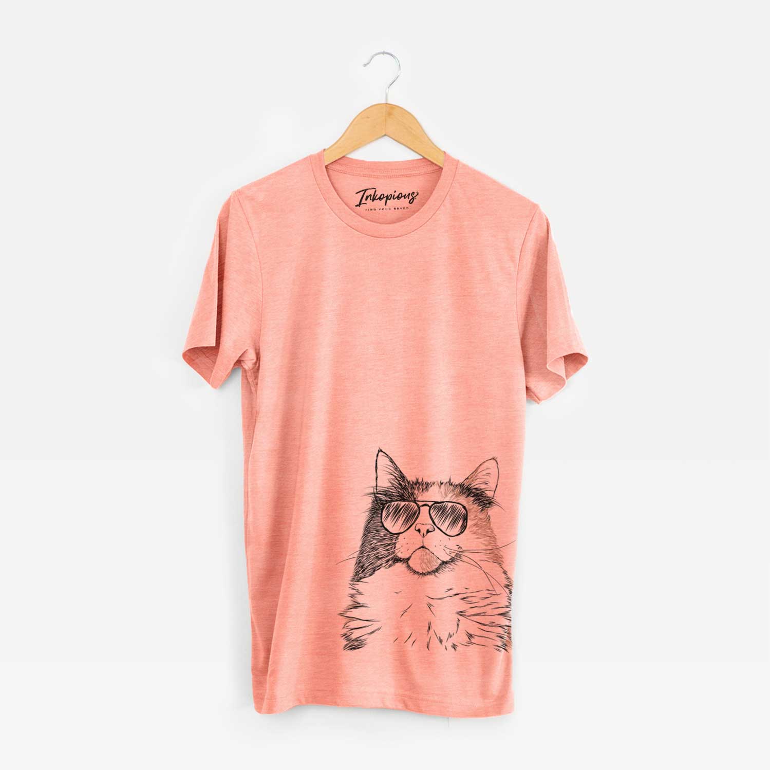 Hand-drawn sketch of Greta the Calico Cat wearing aviator sunglasses on a Sunset Unisex crewneck