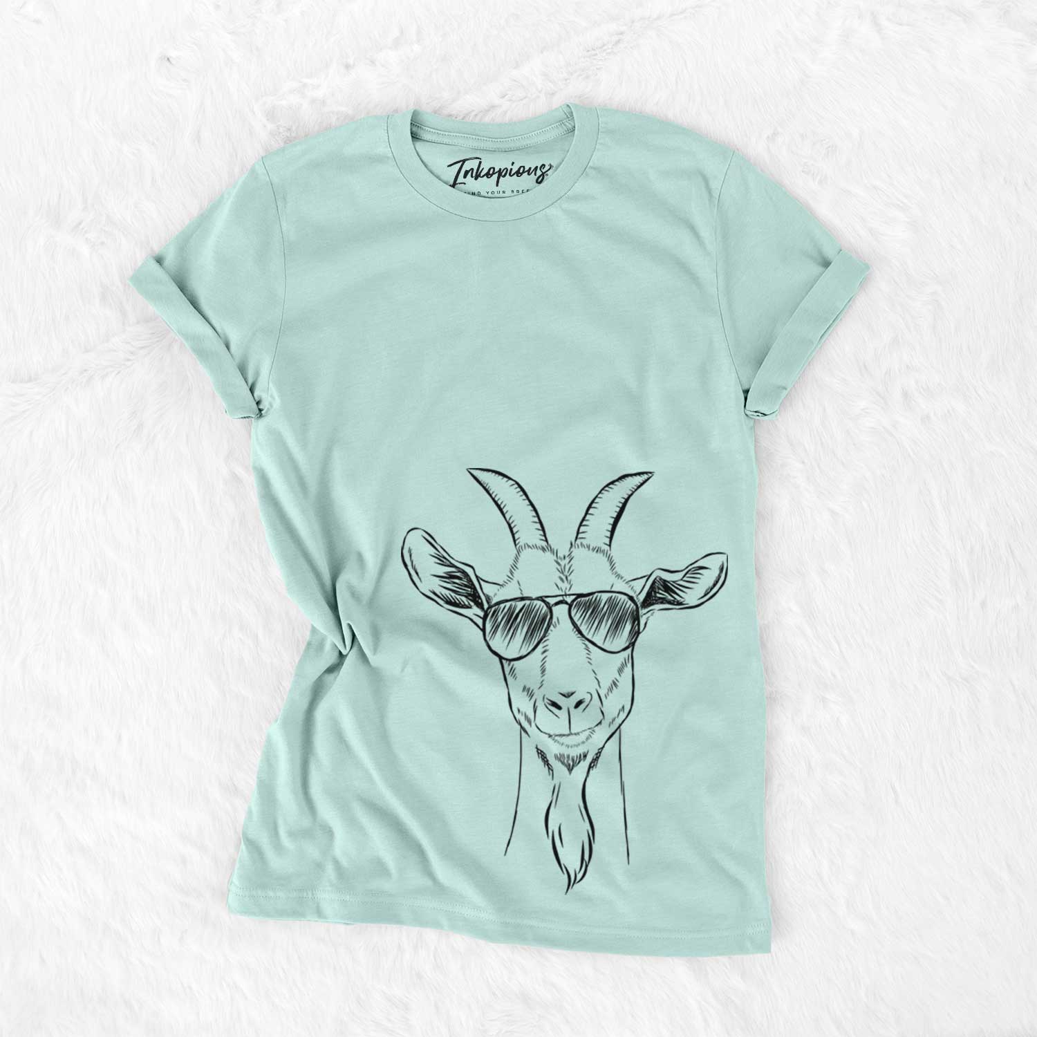 Hand-drawn sketch of Gunnar the Goat wearing aviator sunglasses on a Heather Sage Unisex crewneck