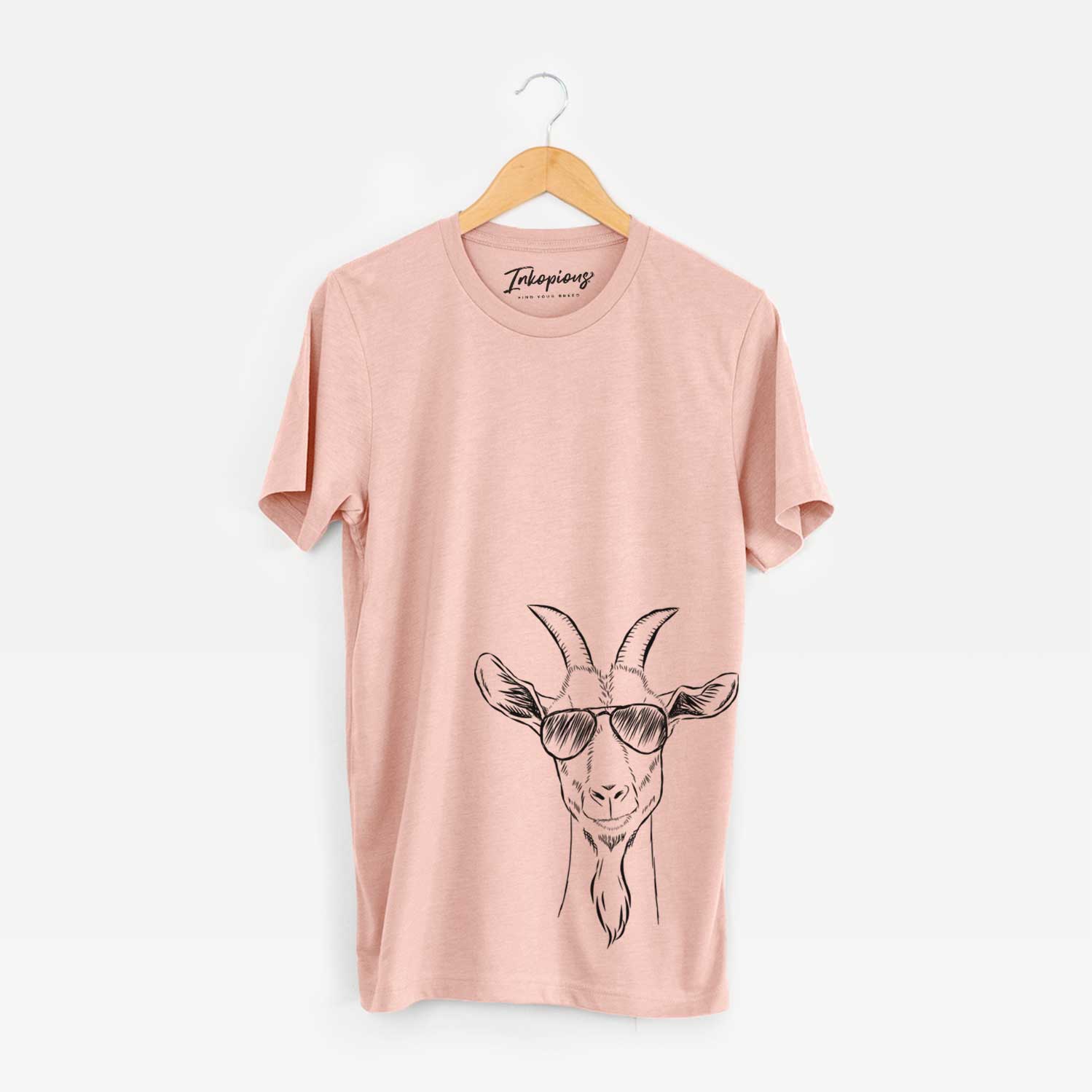 Hand-drawn sketch of Gunnar the Goat wearing aviator sunglasses on a Peach Unisex crewneck