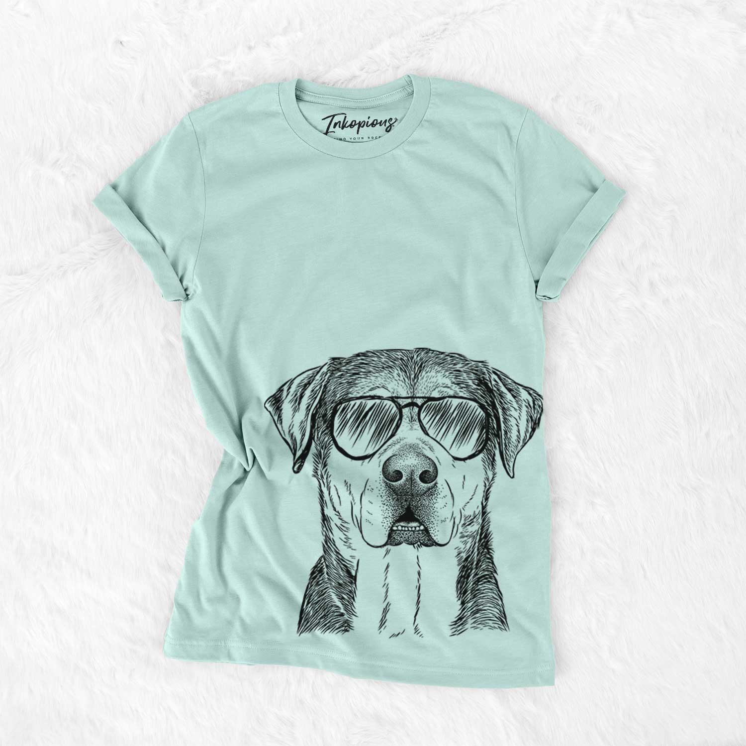 Hand-drawn sketch of Gus the Rottweiler Mix wearing aviator sunglasses on a Heather Sage Unisex crewneck