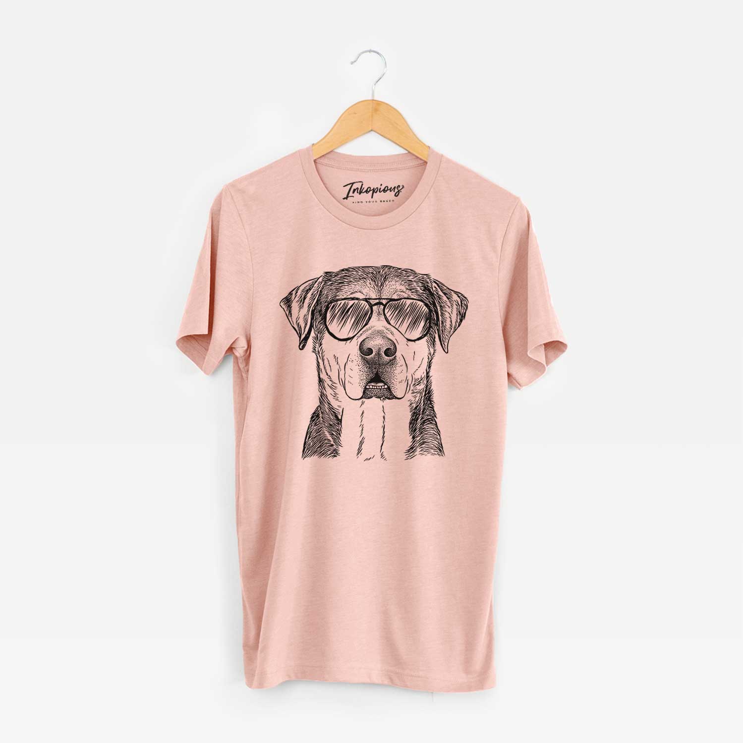 Hand-drawn sketch of Gus the Rottweiler Mix wearing aviator sunglasses on a Peach Unisex crewneck