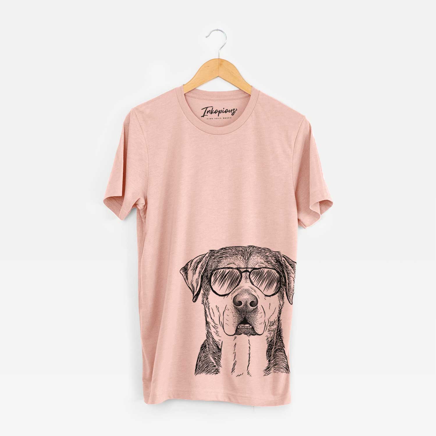 Hand-drawn sketch of Gus the Rottweiler Mix wearing aviator sunglasses on a Peach Unisex crewneck