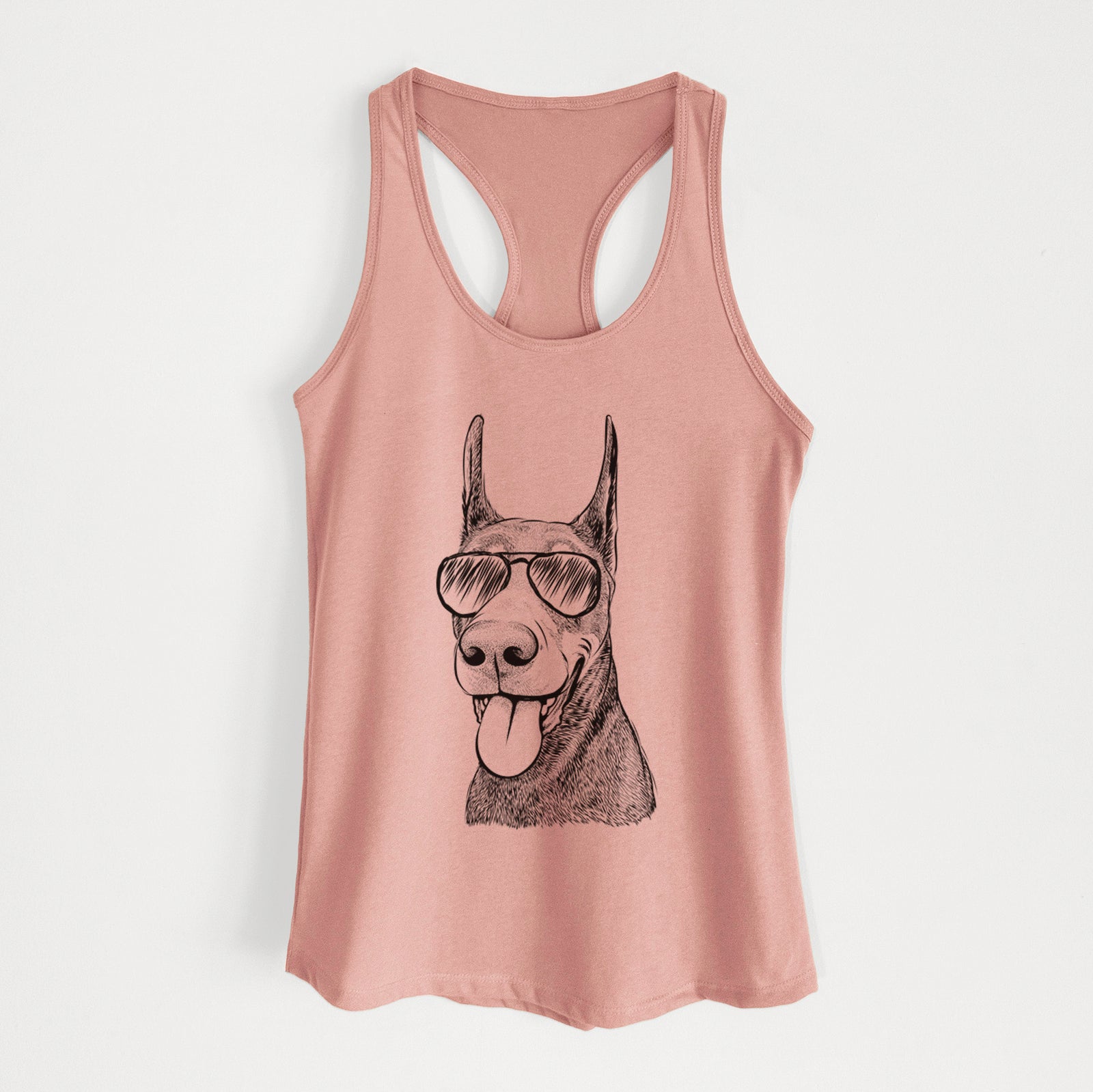 Hand-drawn sketch of Happy Sunny the Doberman Pinscher wearing aviator sunglasses on a Desert Pink Women's racerback tanktop