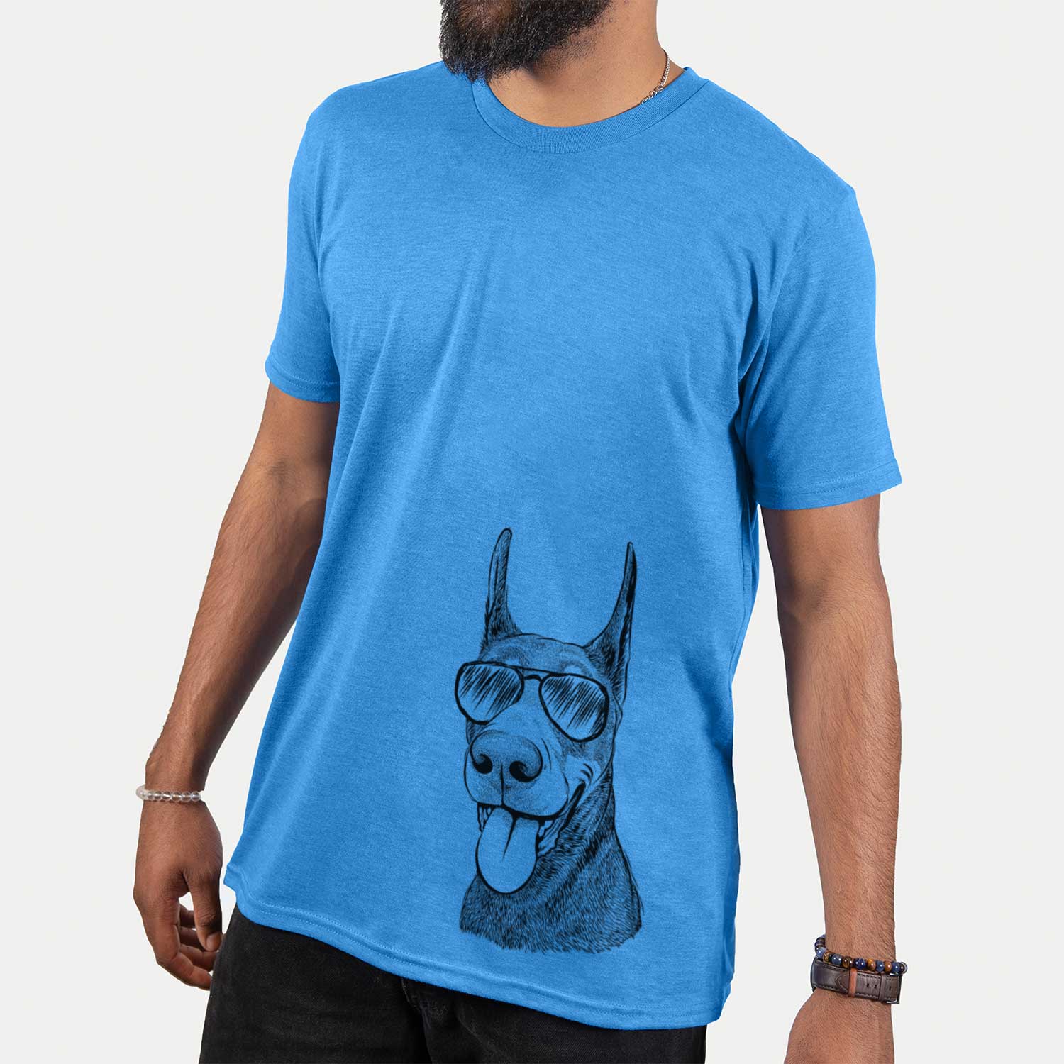 Hand-drawn sketch of Happy Sunny the Doberman Pinscher wearing aviator sunglasses on a Blue Unisex crewneck
