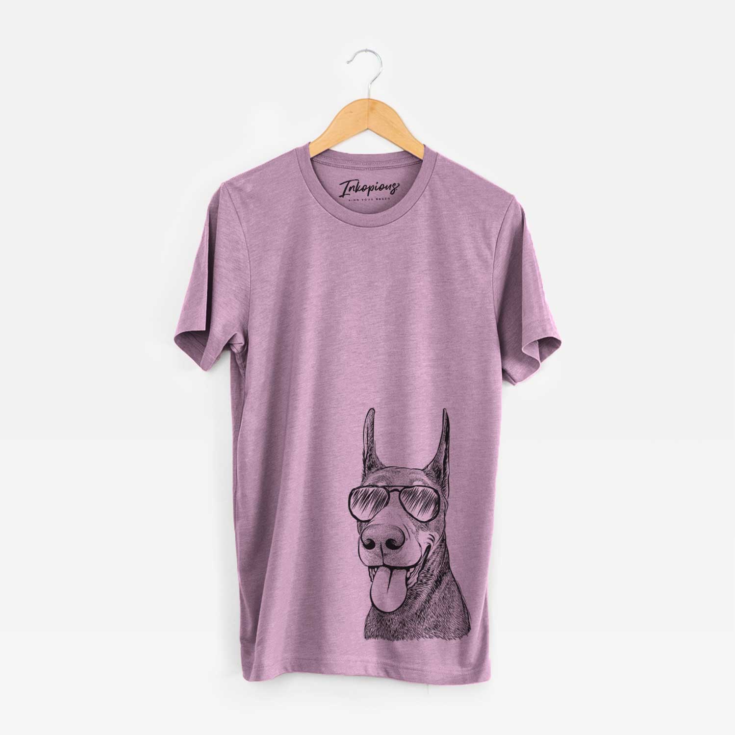 Hand-drawn sketch of Happy Sunny the Doberman Pinscher wearing aviator sunglasses on an Orchid Bella Canvas Unisex Crewneck