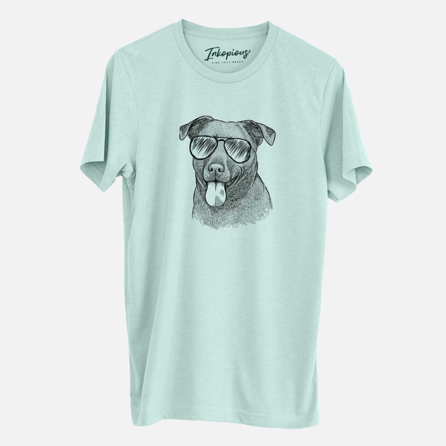 Hand-drawn sketch of Harbor the Mixed Breed wearing aviator sunglasses on a Heather Sage Unisex crewneck