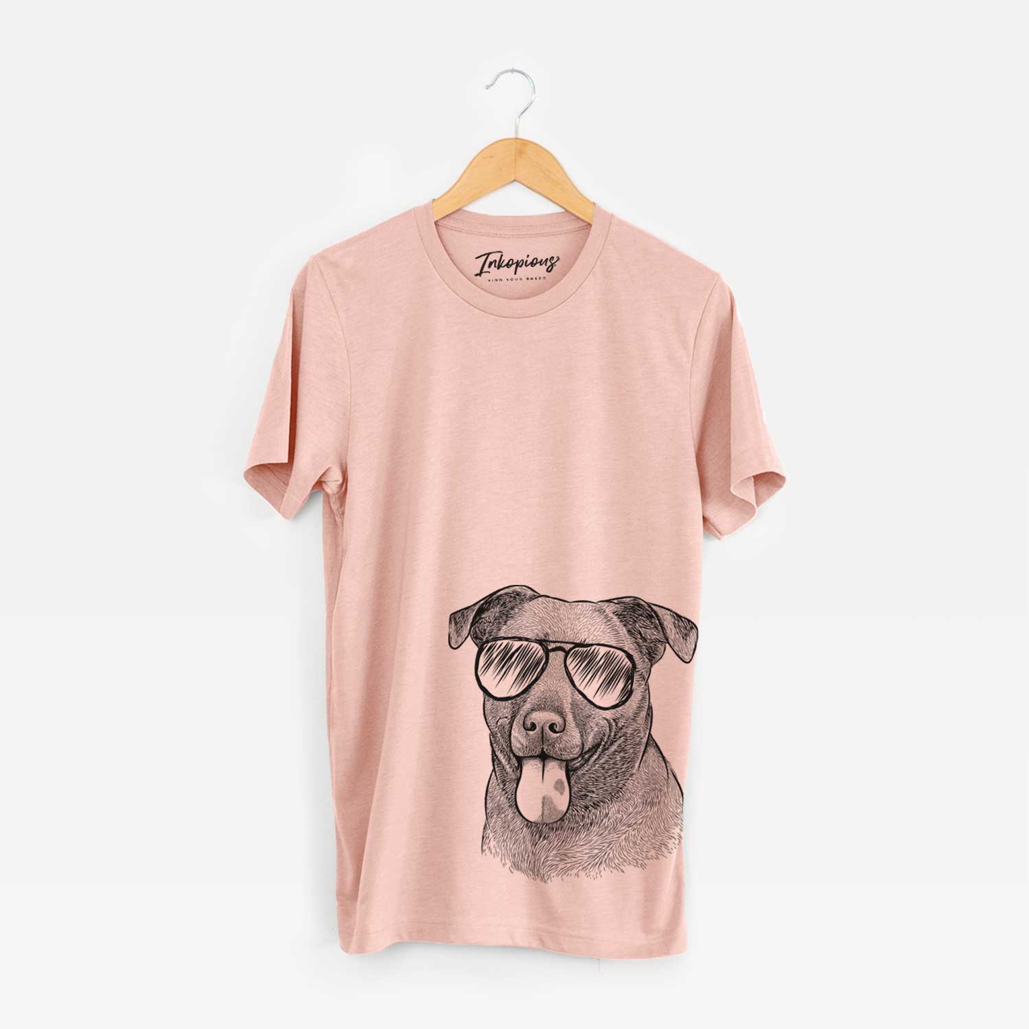 Hand-drawn sketch of Harbor the Mixed Breed wearing aviator sunglasses on a Peach Bella Canvas Unisex Crewneck