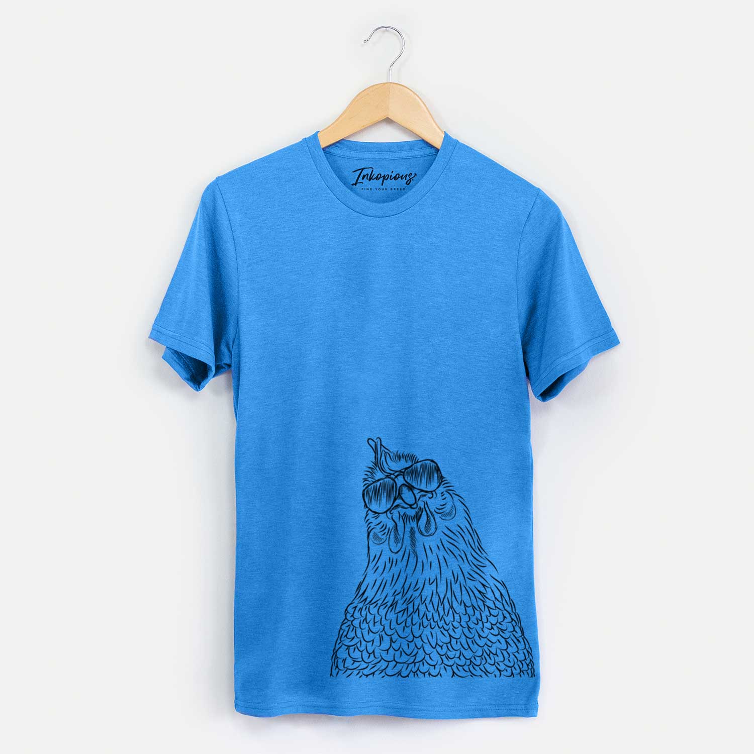 Hand-drawn sketch of Henrietta the Chicken wearing aviator sunglasses on a Blue Unisex crewneck
