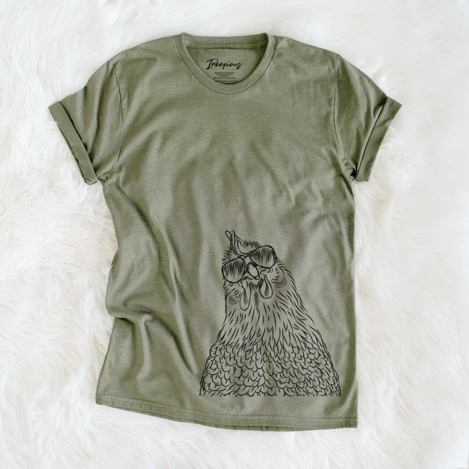 Hand-drawn sketch of Henrietta the Chicken wearing aviator sunglasses on an Olive Unisex crewneck